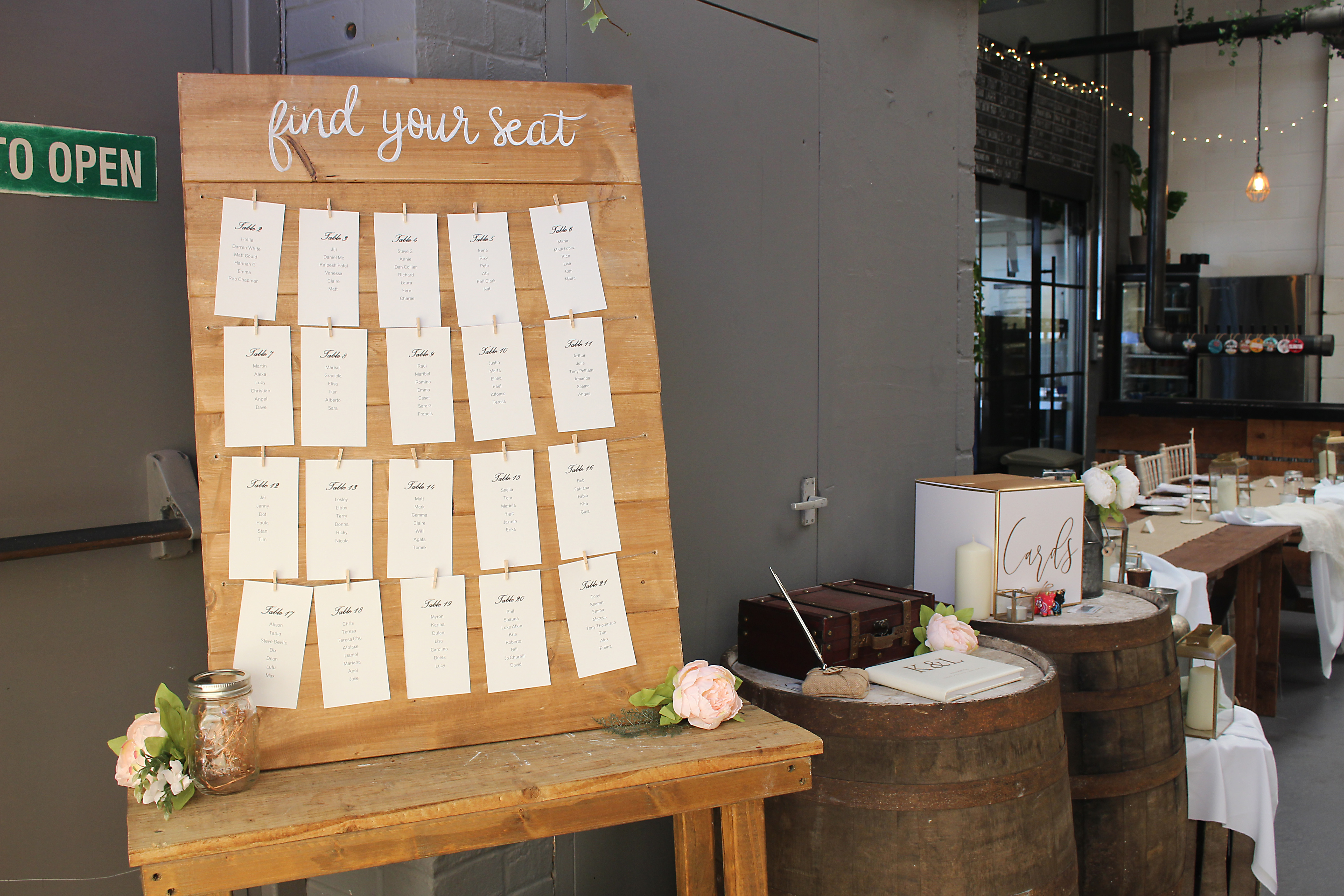 Brewery Taproom seating chart with rustic wood and floral accents for weddings or events.