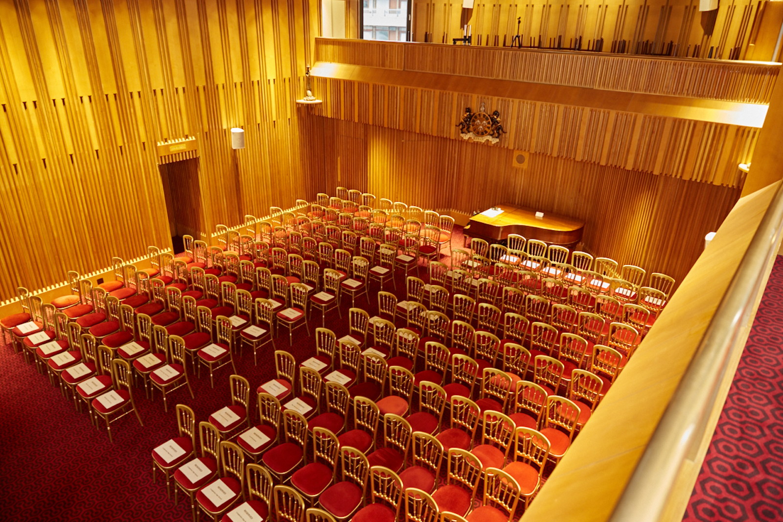 Main Hall at Salters' Hall with wooden paneling, ideal for conferences and gatherings.