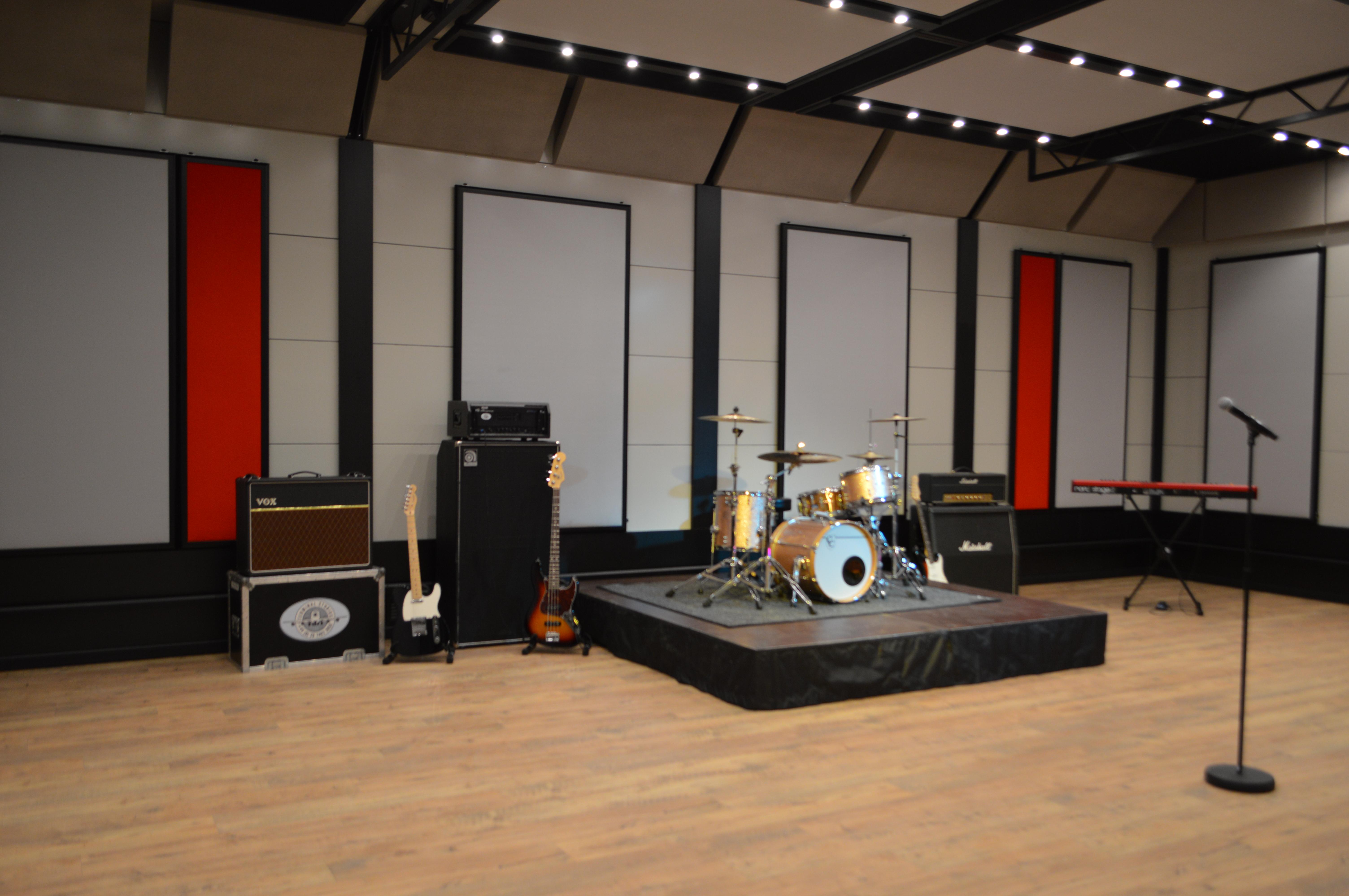 Rehearsal studio in London with stage, ideal for concerts and corporate events.