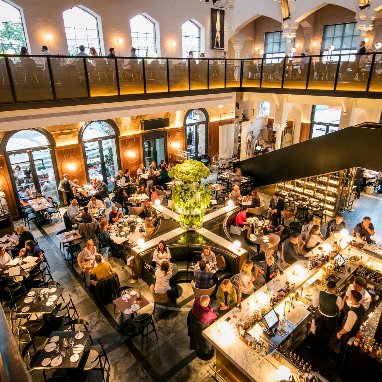 Grand Café in German Gymnasium: vibrant restaurant for events with stylish décor and natural light.