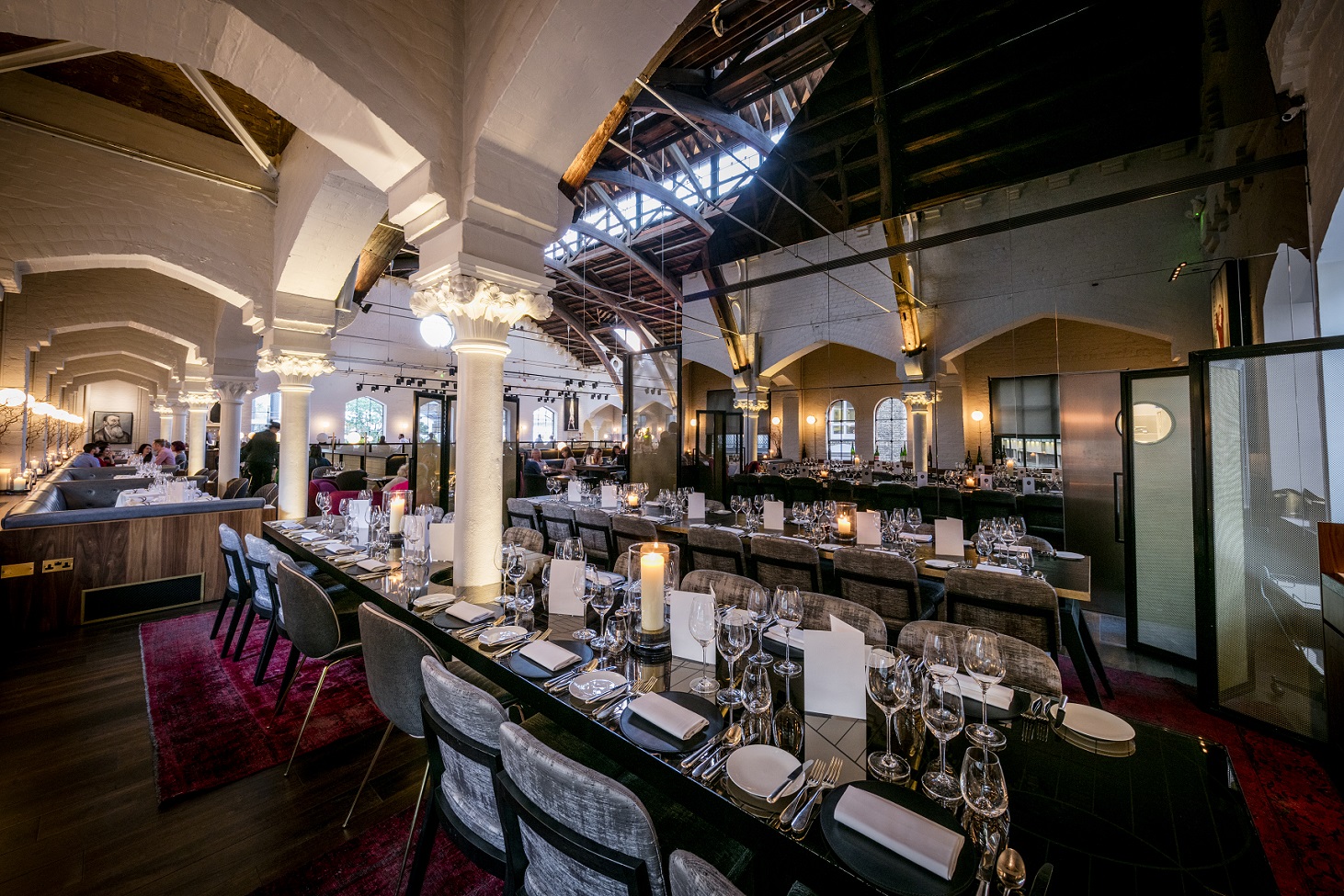 Semi-private dining room at German Gymnasium, ideal for upscale corporate events and celebrations.