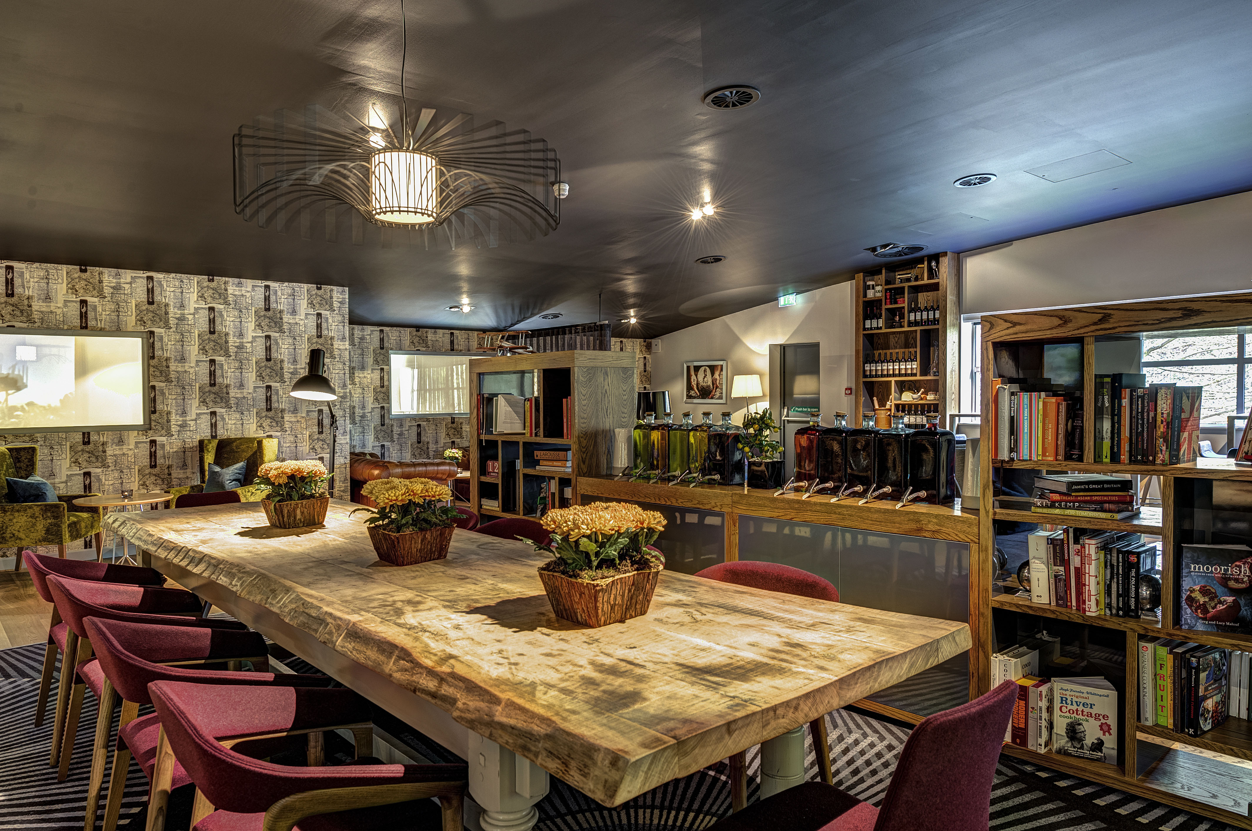 Stylish lounge with wooden table, ideal for meetings and brainstorming sessions.