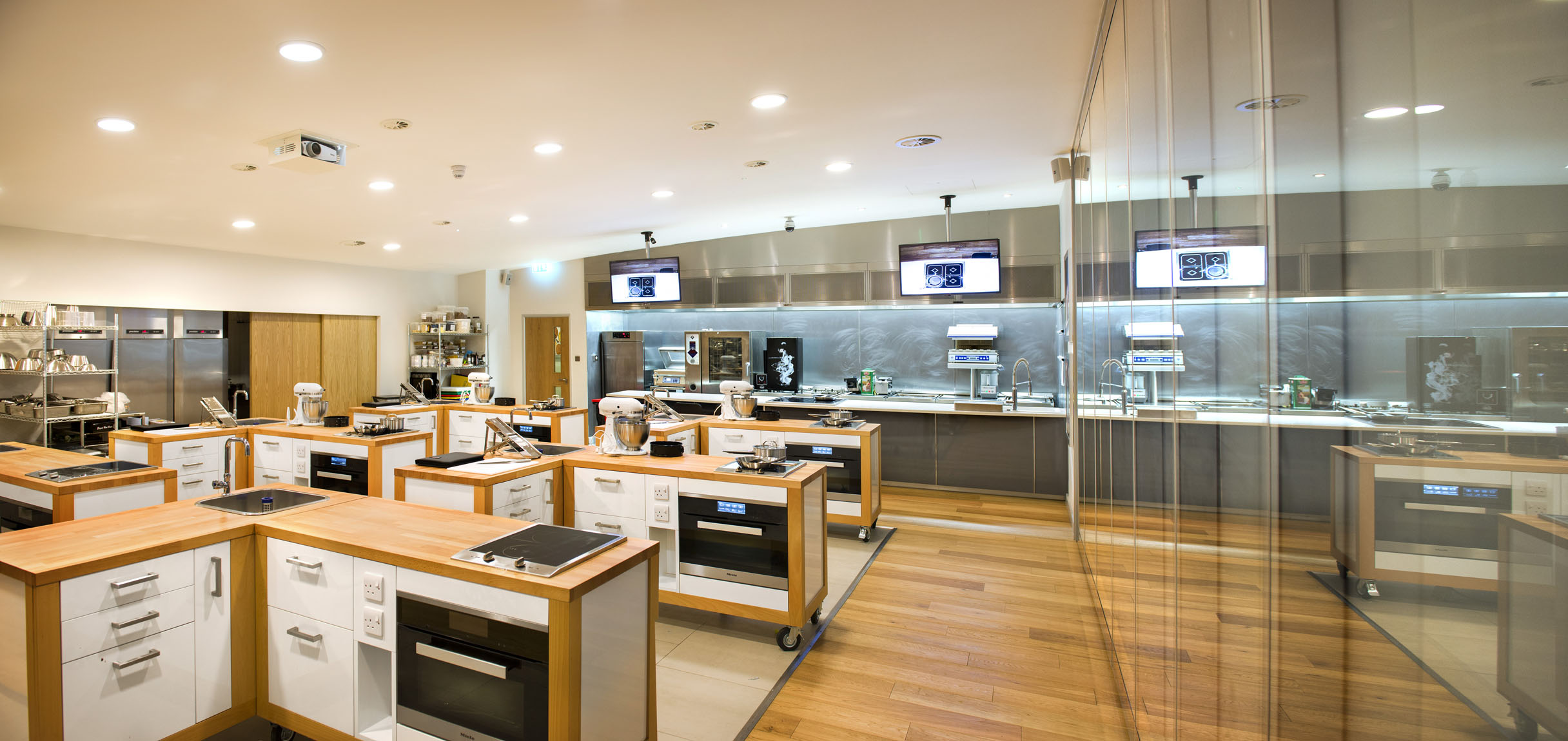 Modern culinary kitchen at SpitfireHouse for interactive cooking classes and events.