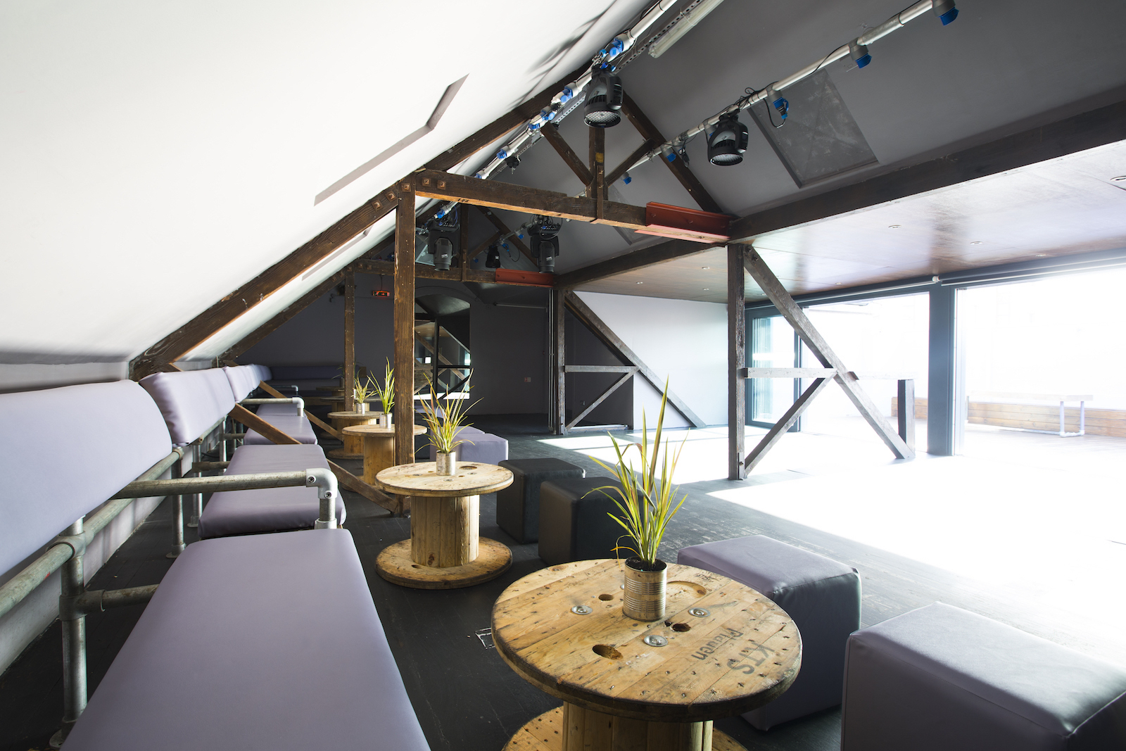 Versatile event space at The Loft in Egg LDN with modern seating, ideal for workshops.