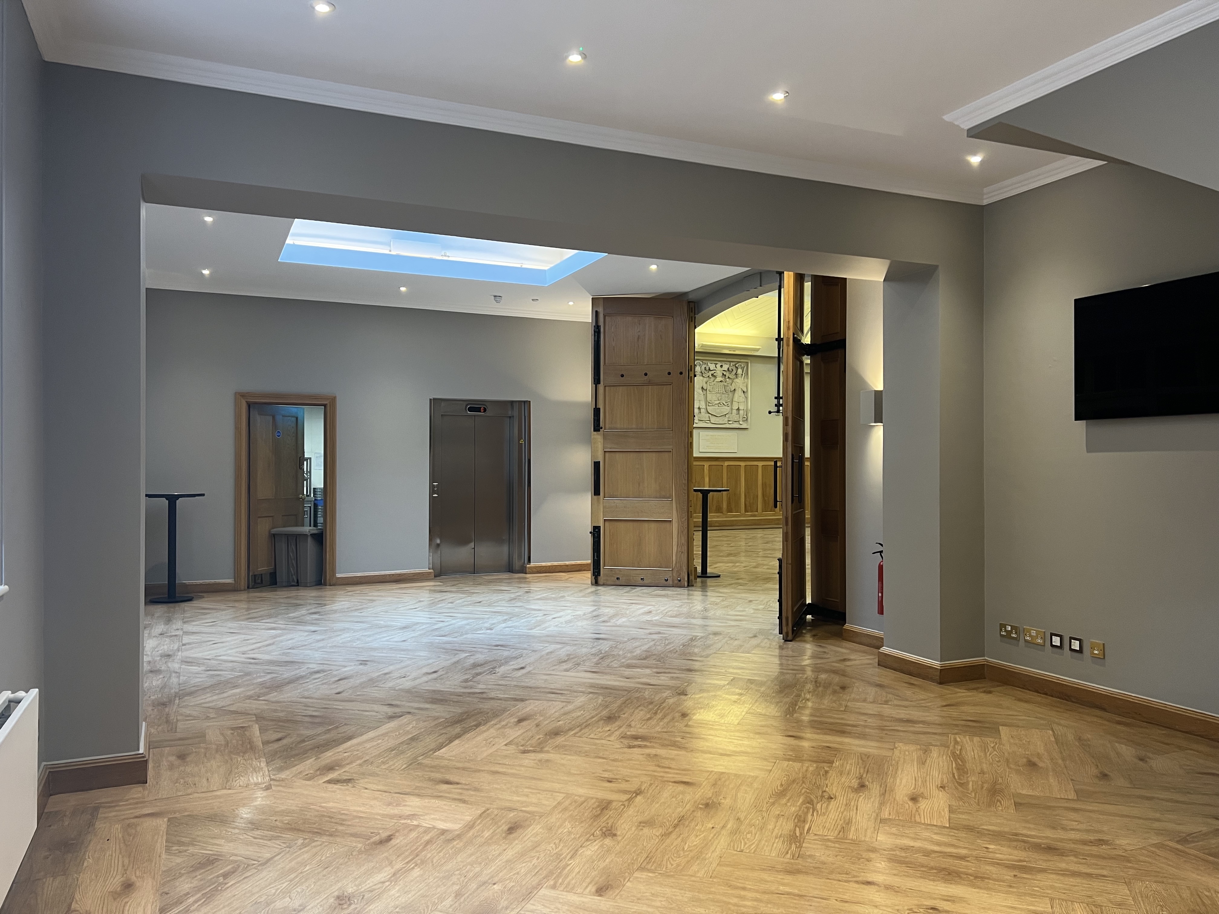 Versatile Prince Consort Rooms with polished flooring, ideal for meetings and receptions.