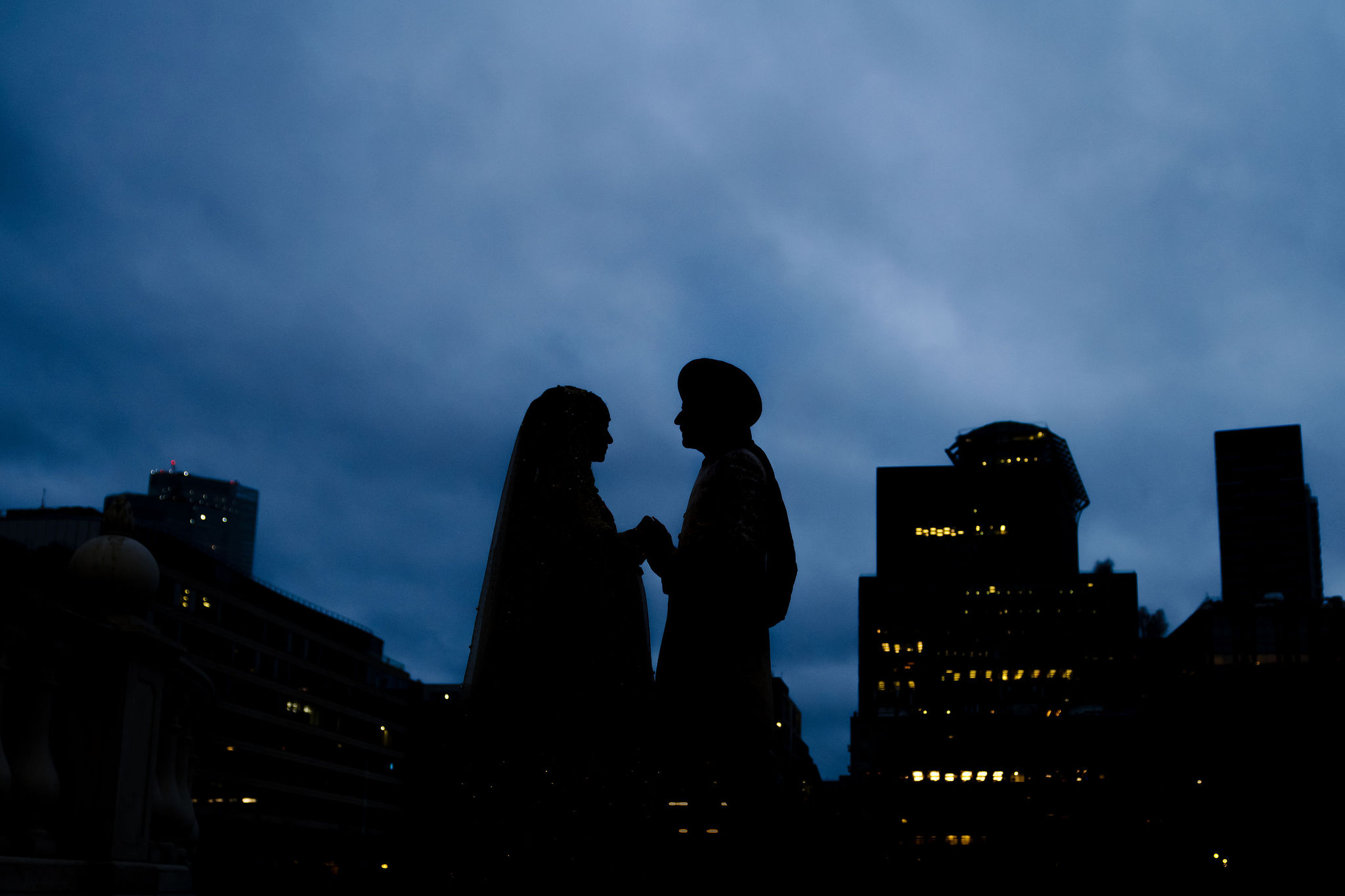 Couple silhouette at Artillery Garden, romantic evening event venue in the city.