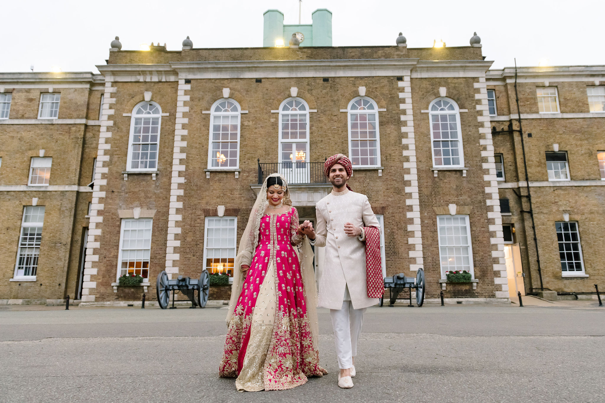 Couple in elegant wedding attire at Artillery Garden, classic venue for sophisticated ceremonies.