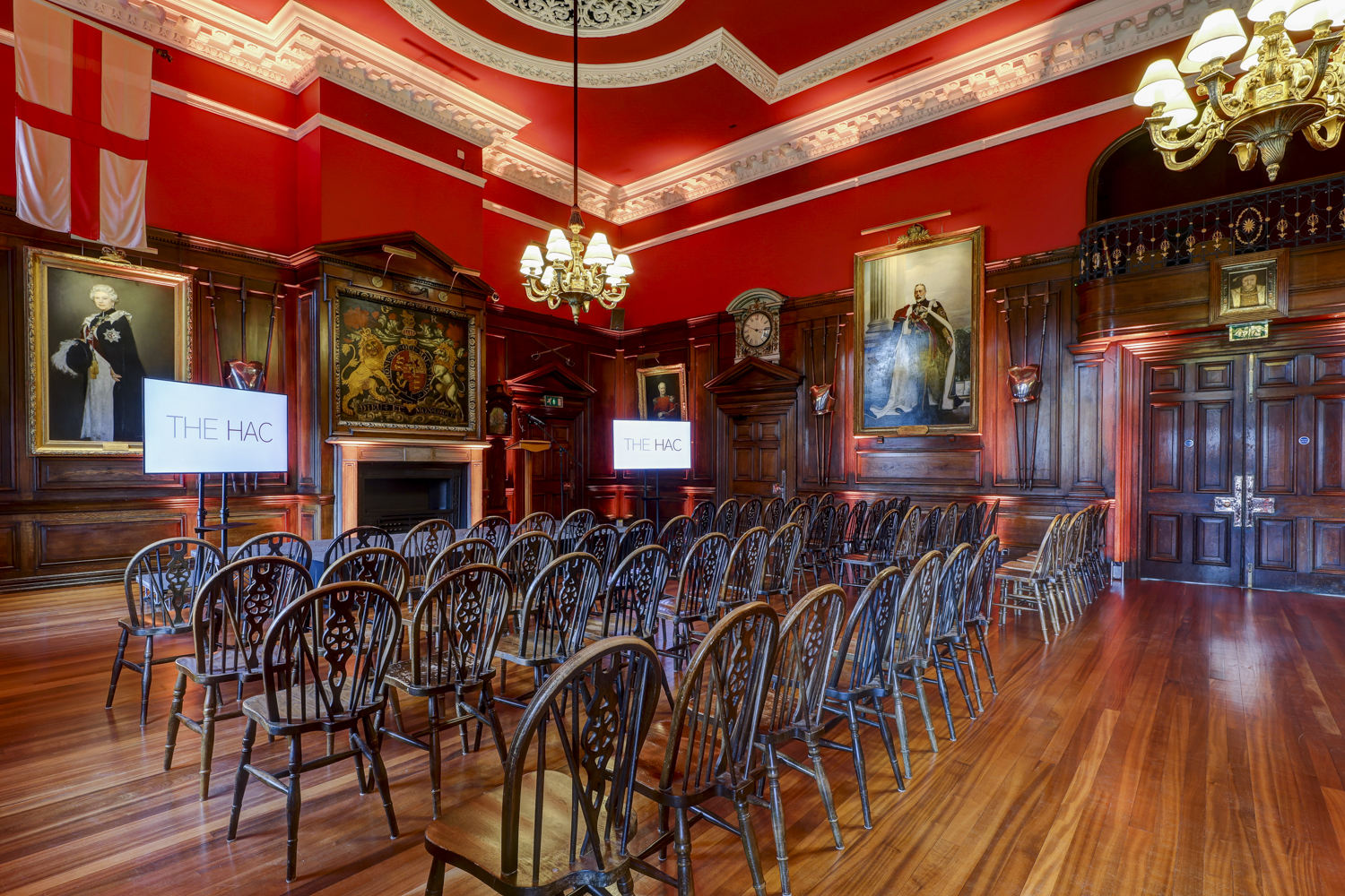 Elegant Long Room at HAC with wooden paneling, ideal for formal events and lectures.