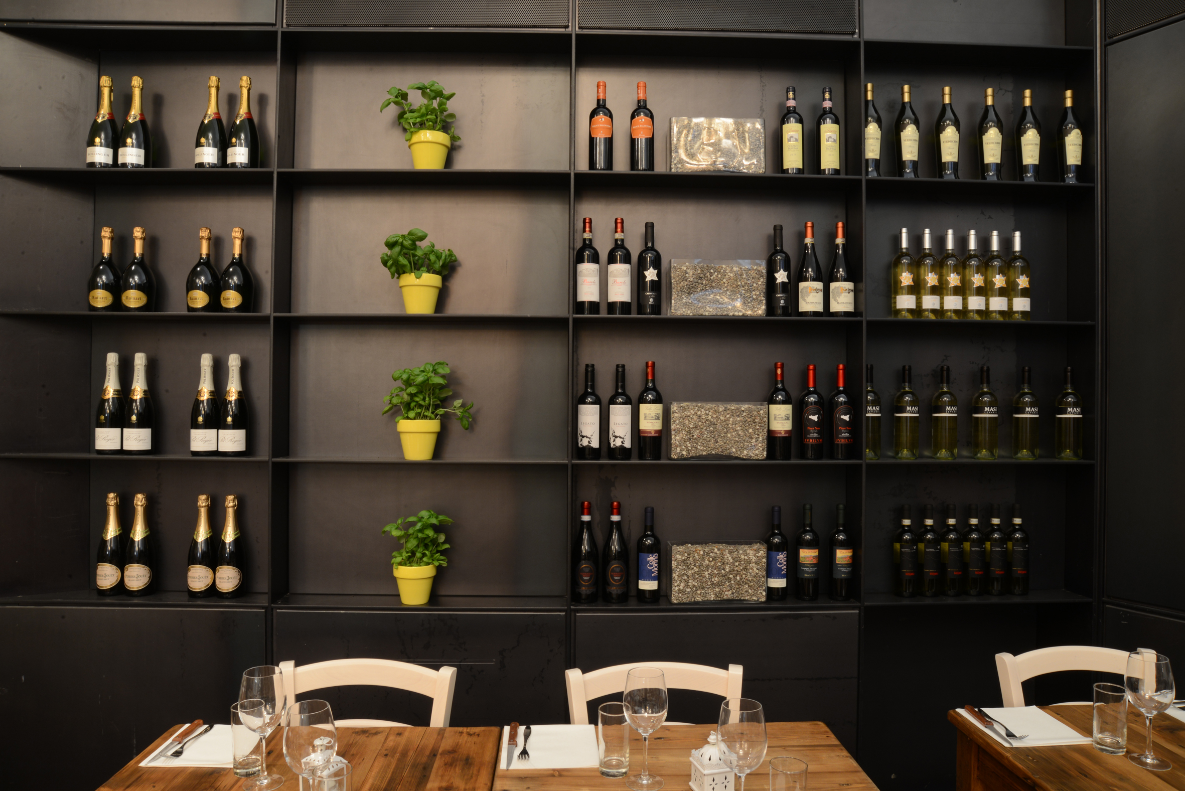 Chandelier Room wine display at The Grand, perfect for tastings and social events.