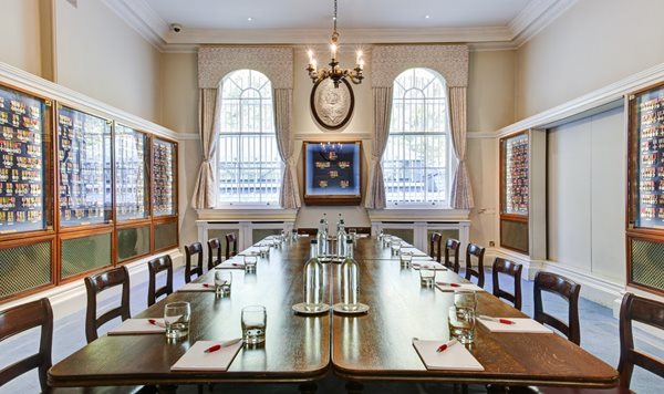 Medal Room at HAC: elegant meeting space with a long table for corporate events.