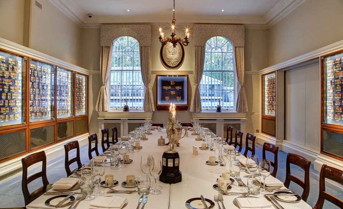 Elegant dining setup in HAC Medal Room for corporate dinners and high-profile meetings.
