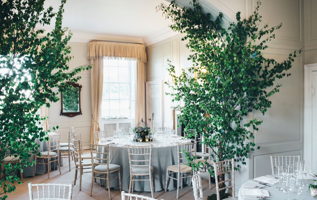 Elegant Wren House event space with round tables, perfect for weddings and corporate events.