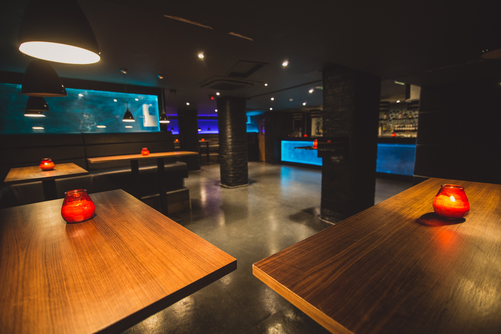 Modern venue in Walrus with warm candlelight, ideal for intimate gatherings and networking.