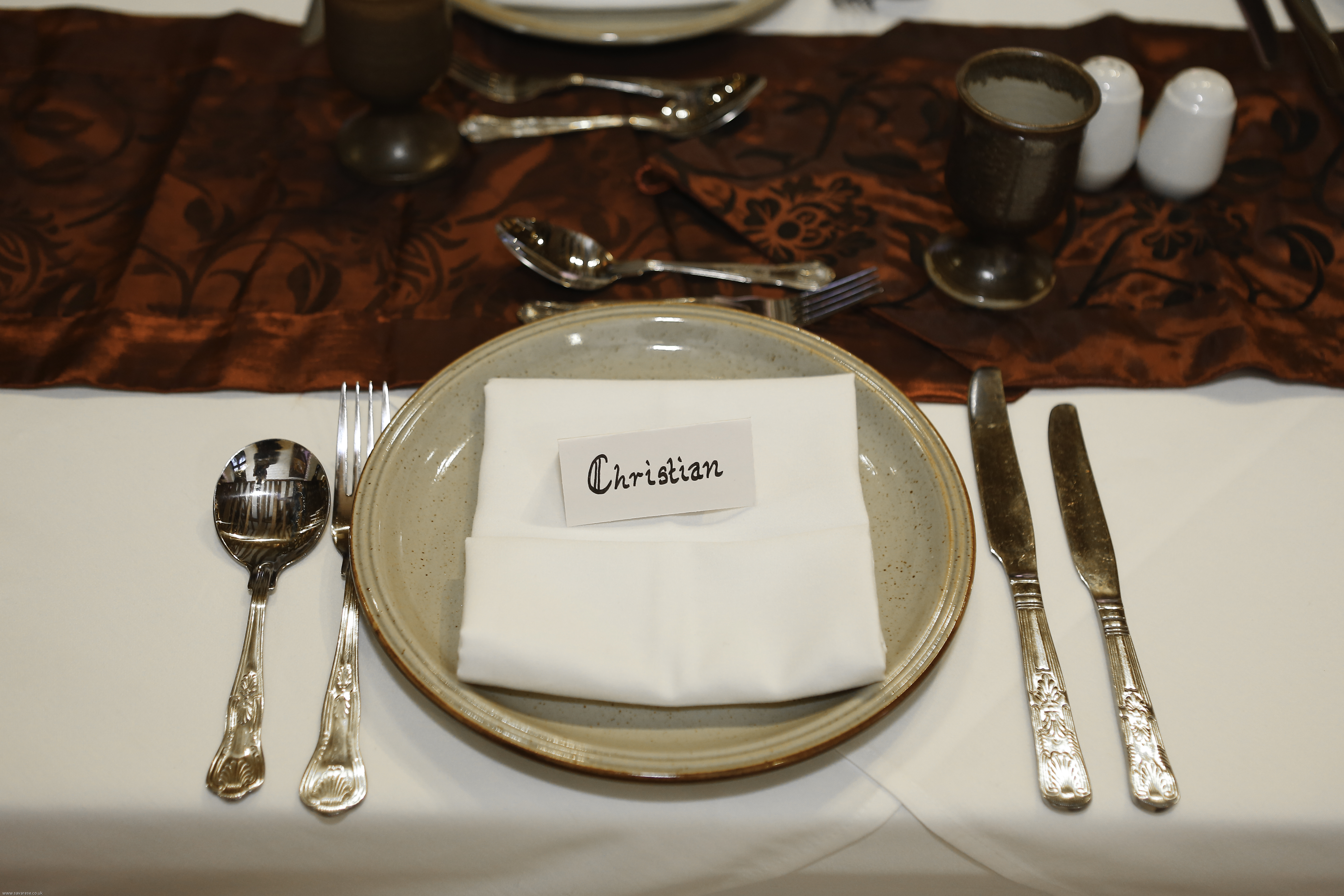 Elegant dining table setup at Tudor Barn Eltham for corporate events and upscale celebrations.
