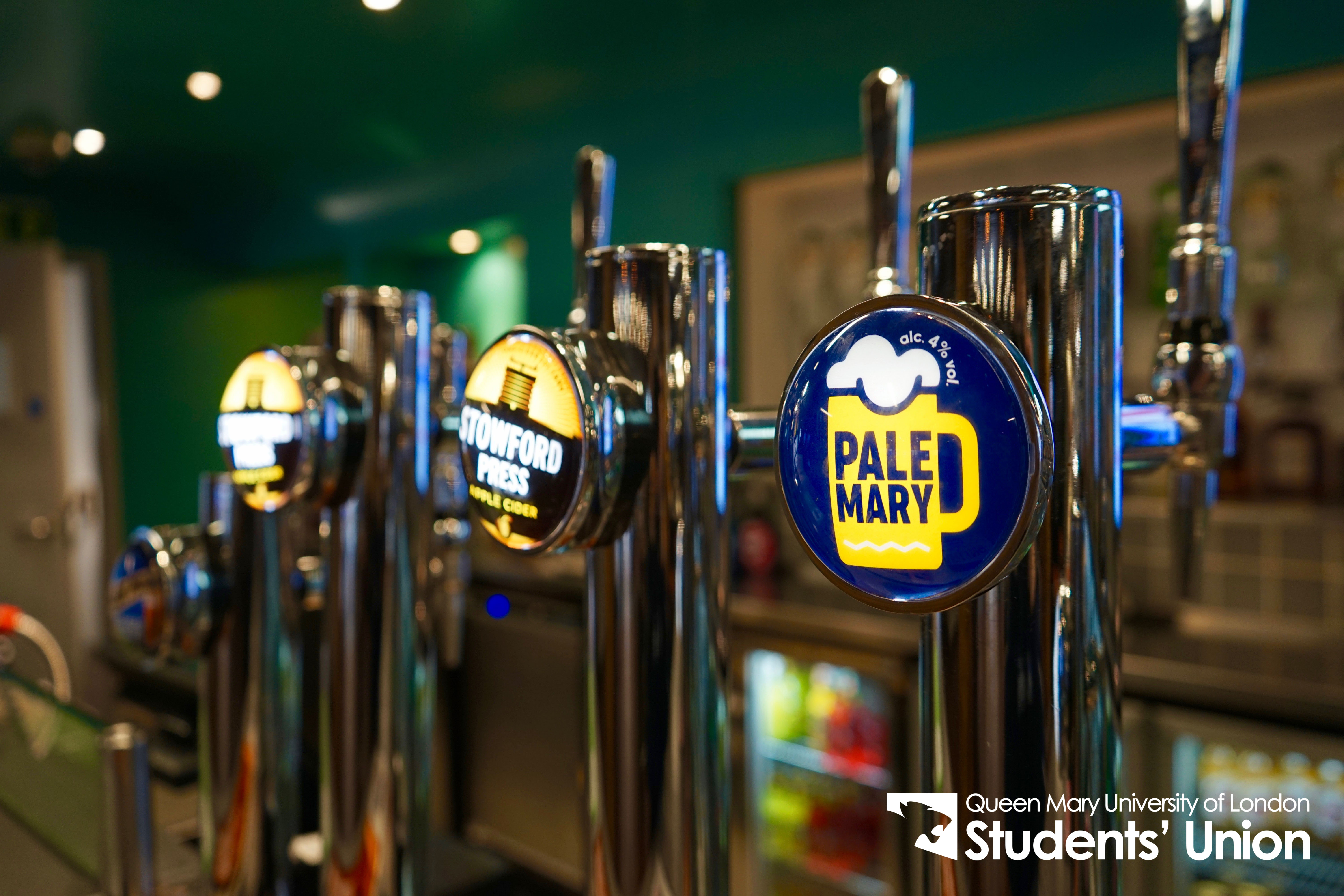 Vibrant bar setup with beer taps at Drapers Bar & Kitchen for social events.
