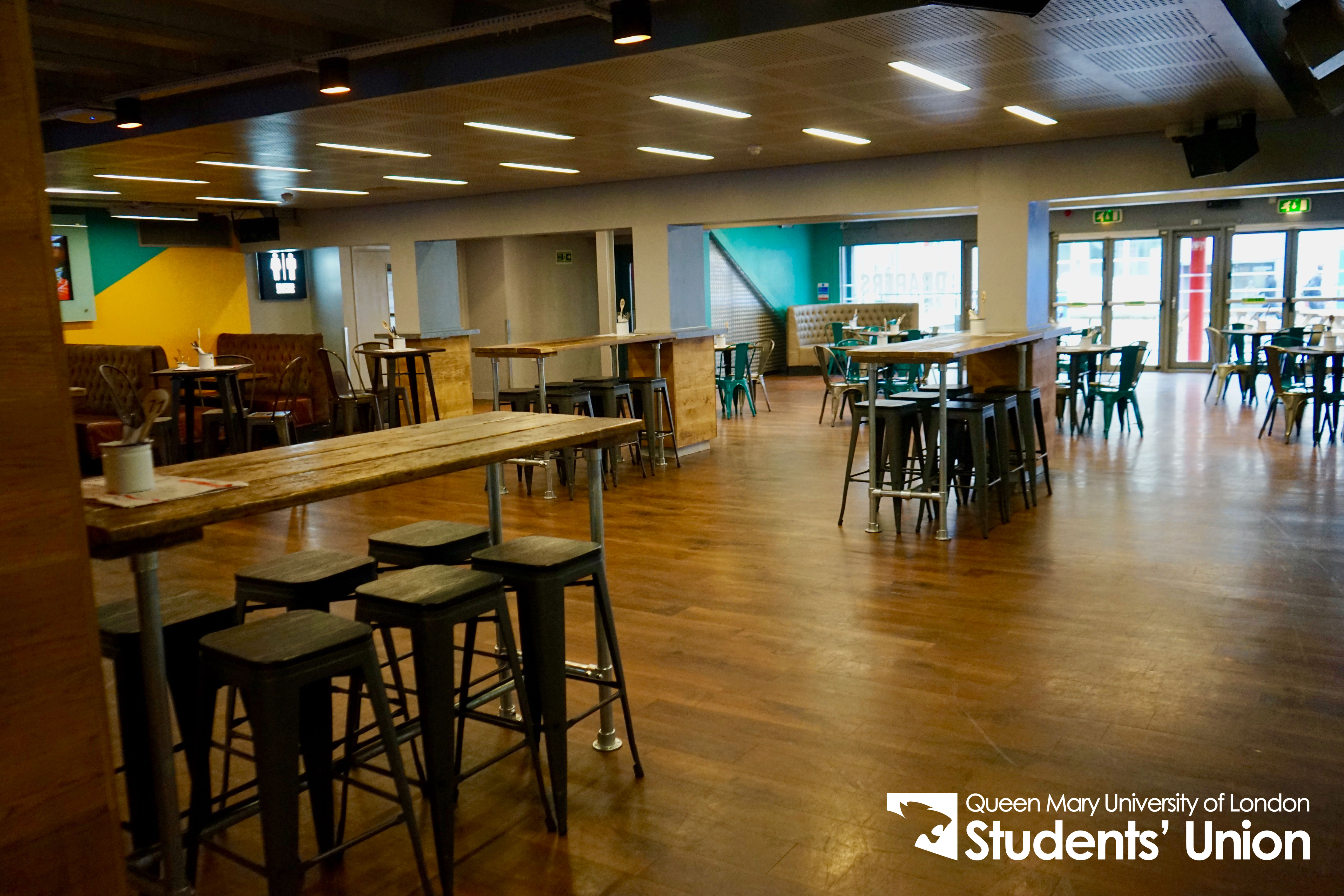 Versatile event space in Drapers Bar & Kitchen with vibrant decor for gatherings and networking.