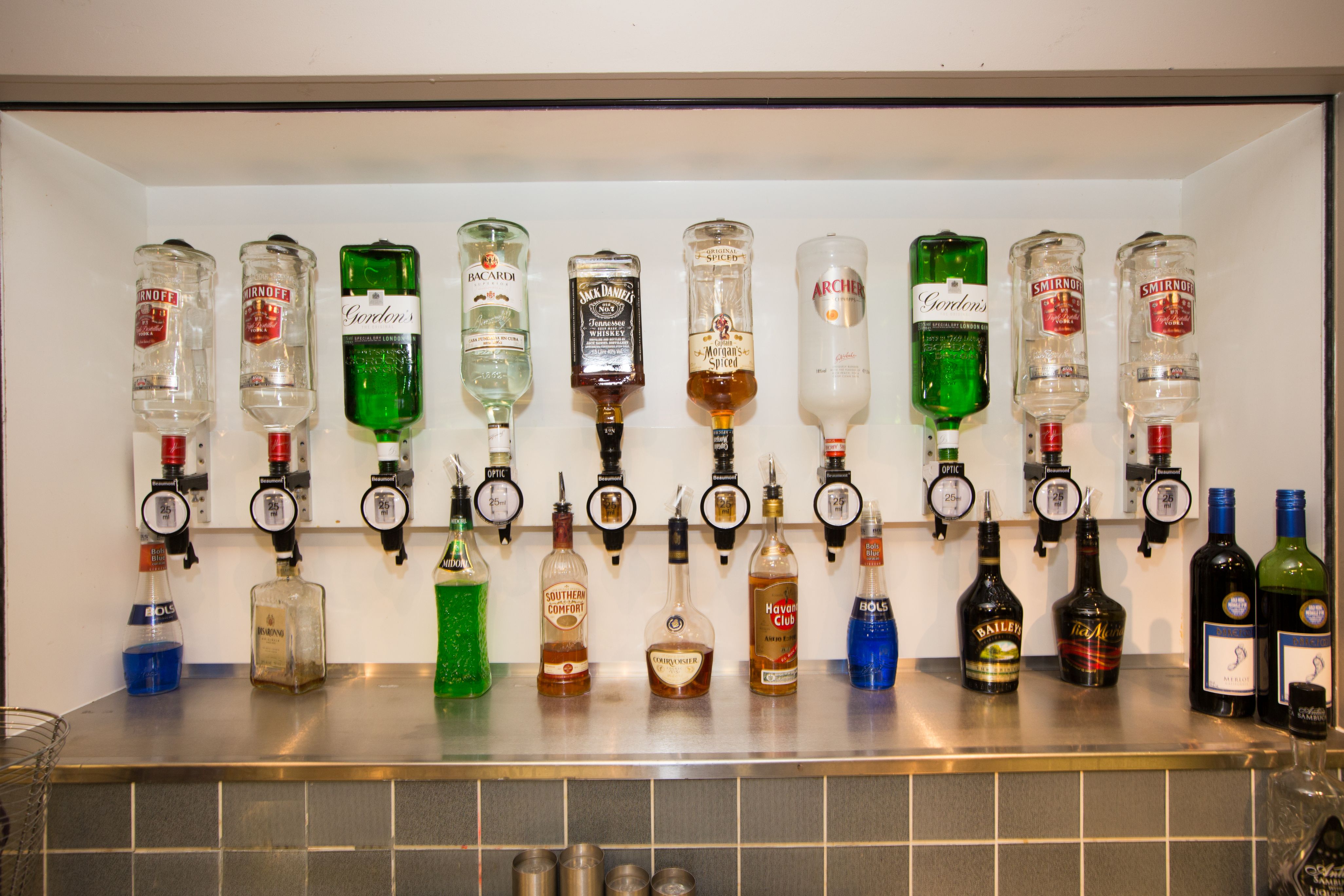Main Room at Drapers Bar & Kitchen with organized bar setup for events and quick service.