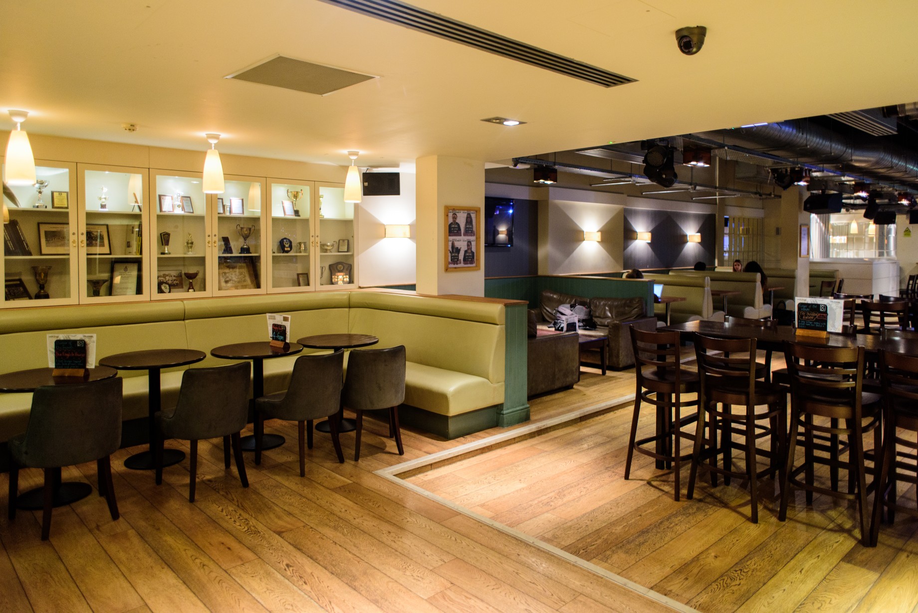 Versatile event space at Griff Inn Bar & Kitchen with warm lighting, ideal for gatherings.