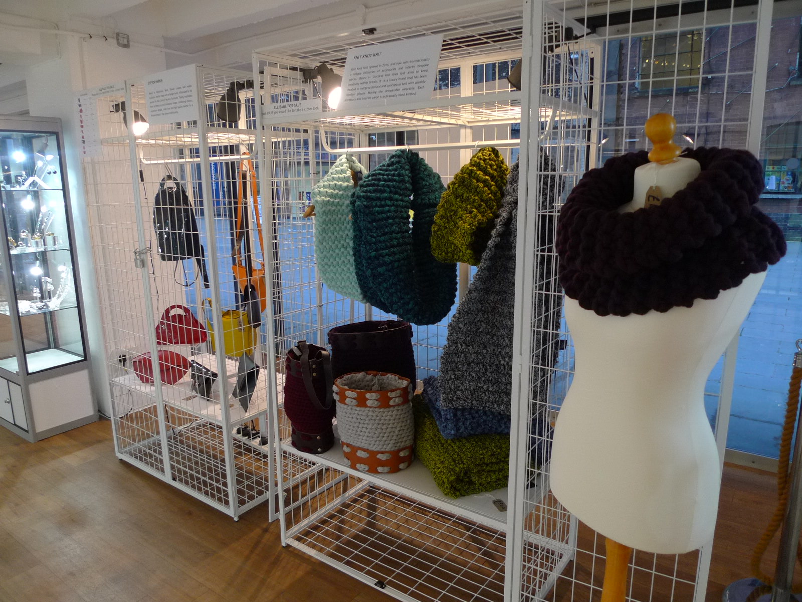 Handmade knitwear display at gallery@oxo, ideal for boutique events and craft fairs.