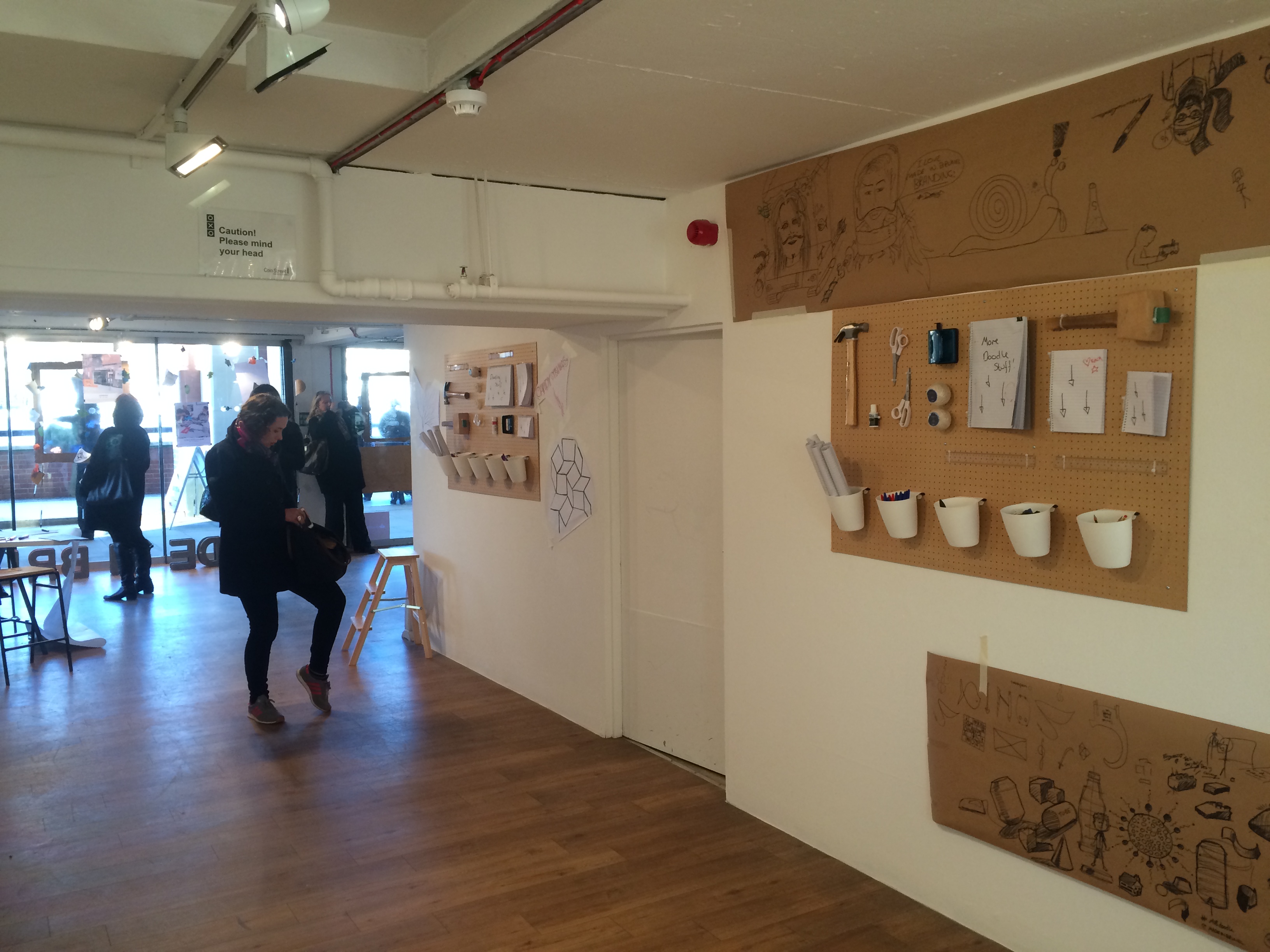 Creative event space at gallery@oxo, featuring interactive walls for workshops and networking.