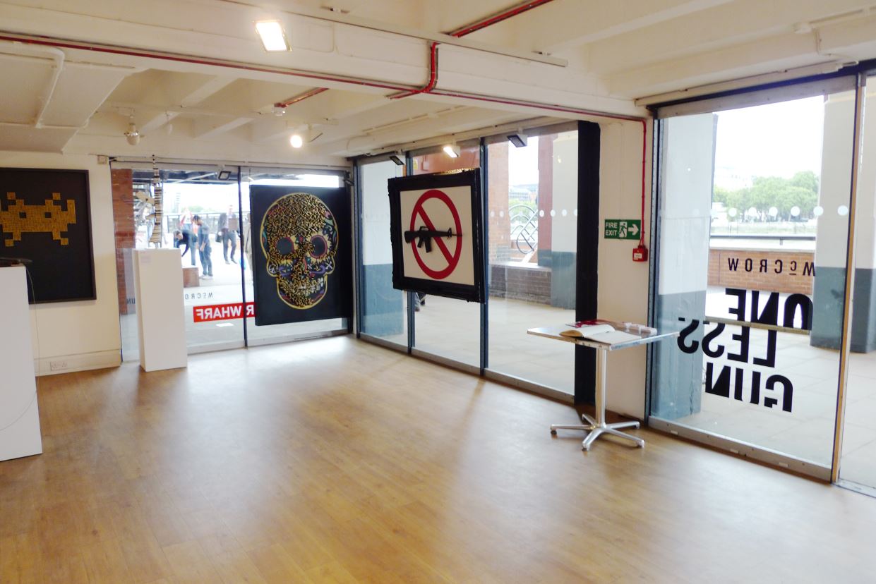 Versatile event space at gallery@oxo with large windows, ideal for meetings and gatherings.