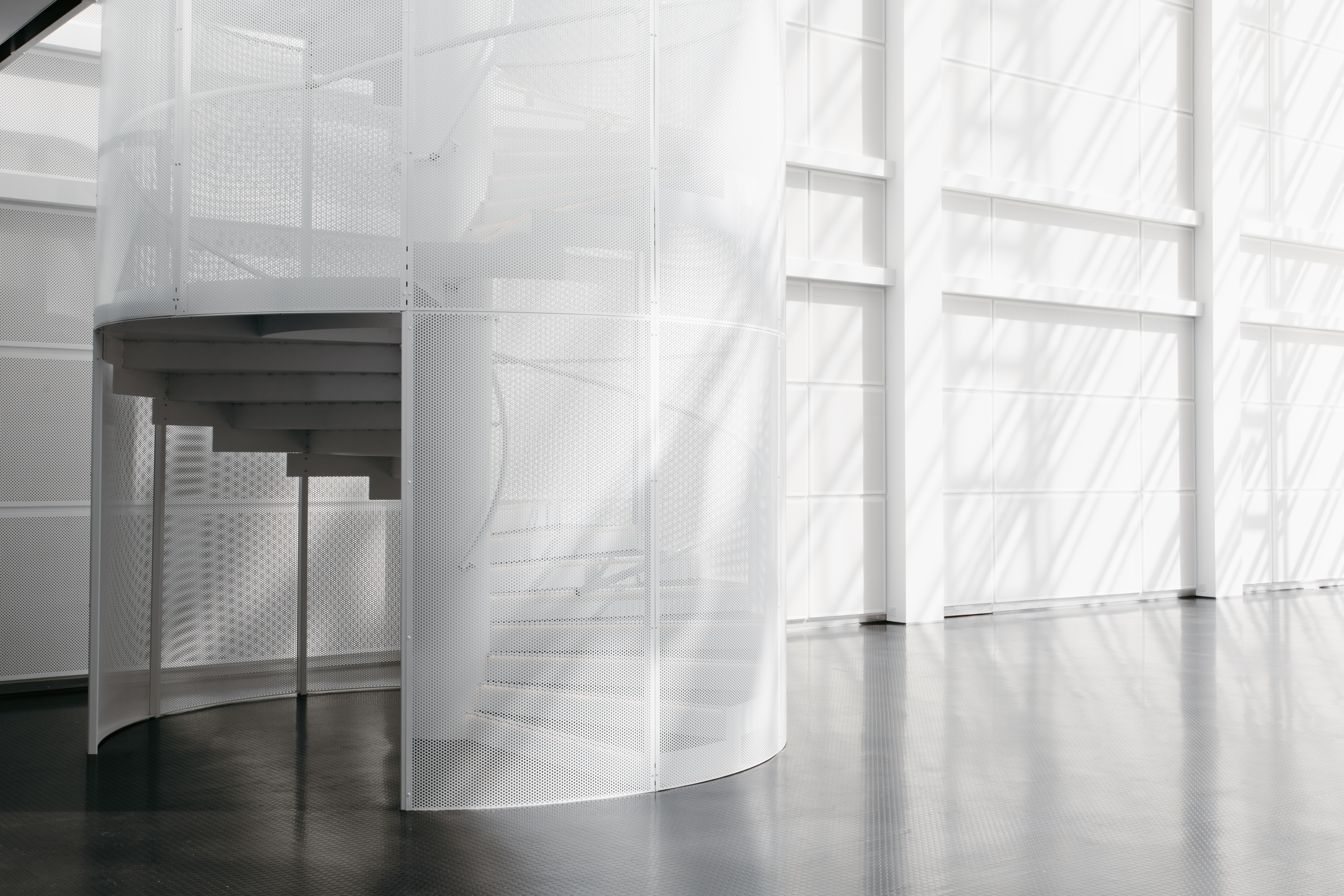 Modern staircase in bright Main Hall, perfect for events and networking.