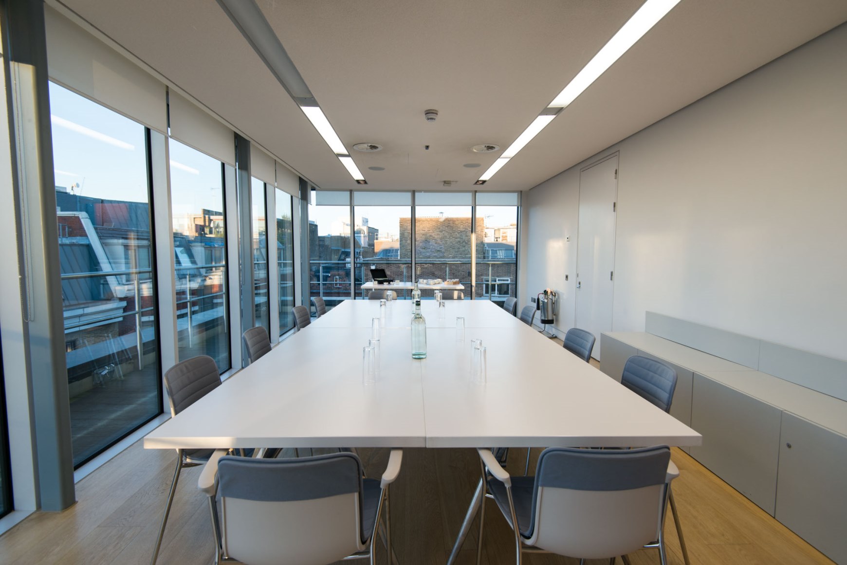 Modern Agas Harding Board Room with large table and natural light for productive meetings.