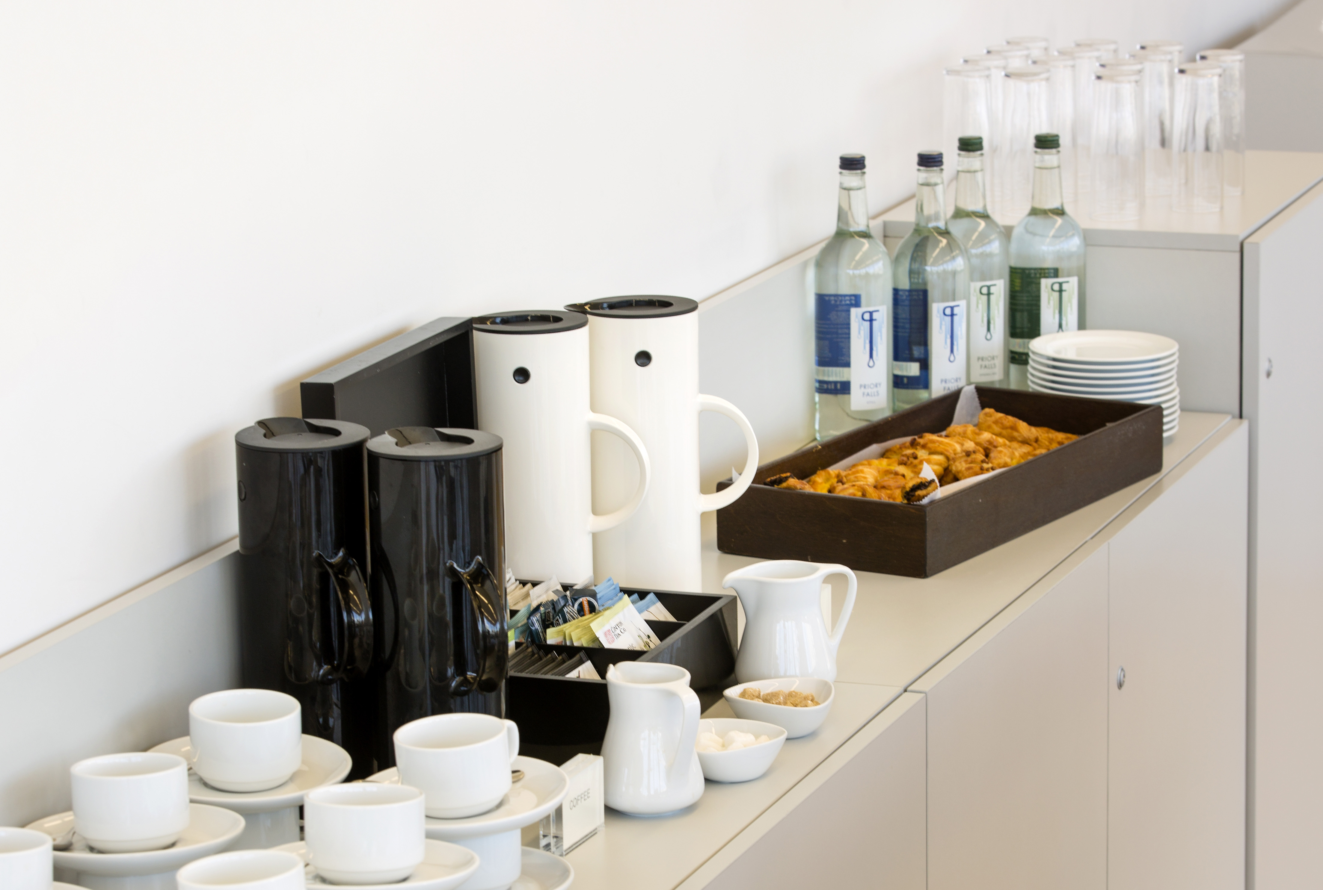 Agas Harding Board Room refreshment station for meetings with coffee, snacks, and water.
