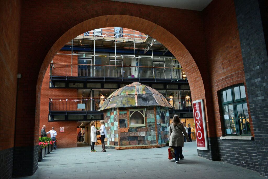 Courtyard & Platform at OXO Tower, modern venue with artistic archway for events.
