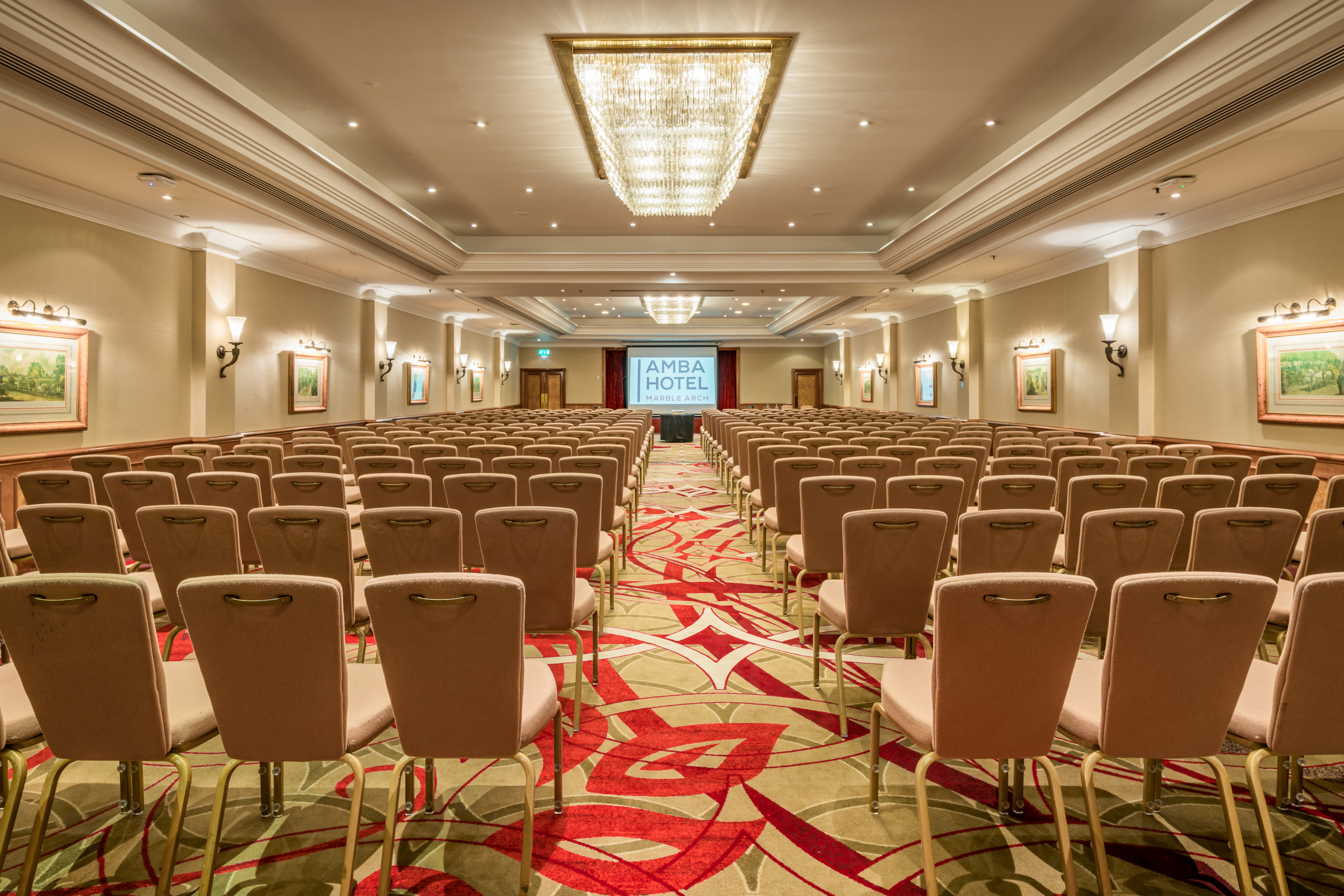 Conference room at Thistle Marble Arch, elegant setup for meetings and seminars.
