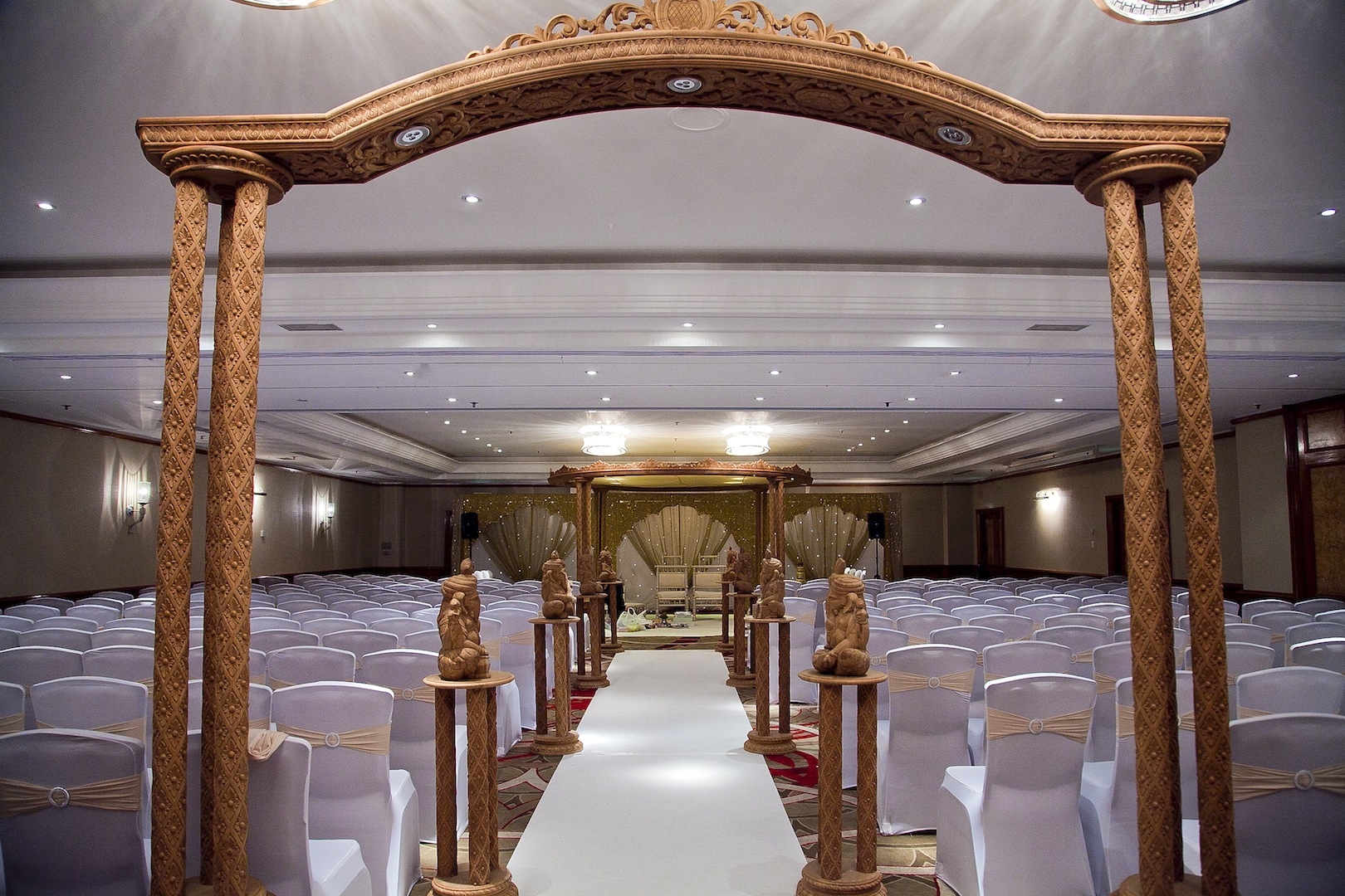 Elegant wedding setup at Park Lane, featuring a stunning archway and inviting ambiance.