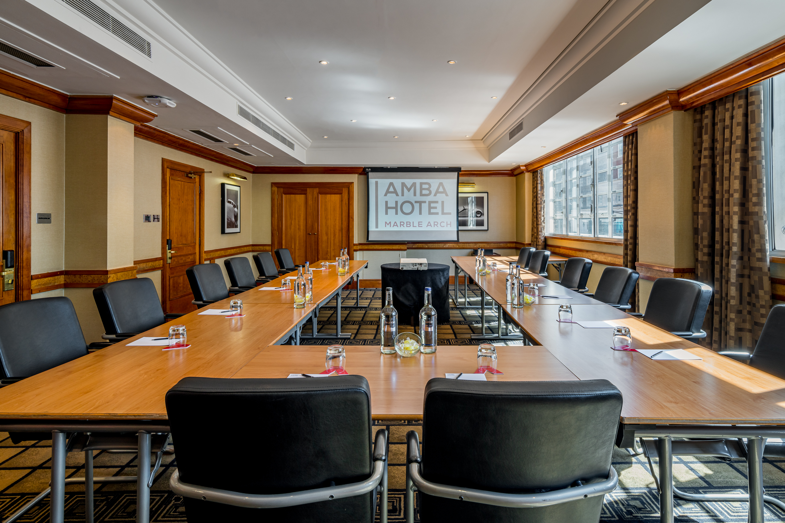 Meeting room at Serpentine, Thistle Marble Arch, with natural light and AV setup.