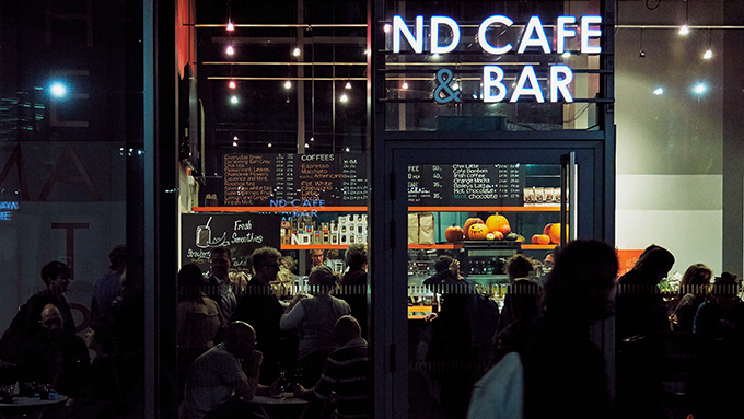 New Diorama Theatre café with warm lighting, perfect for networking events and meet-ups.