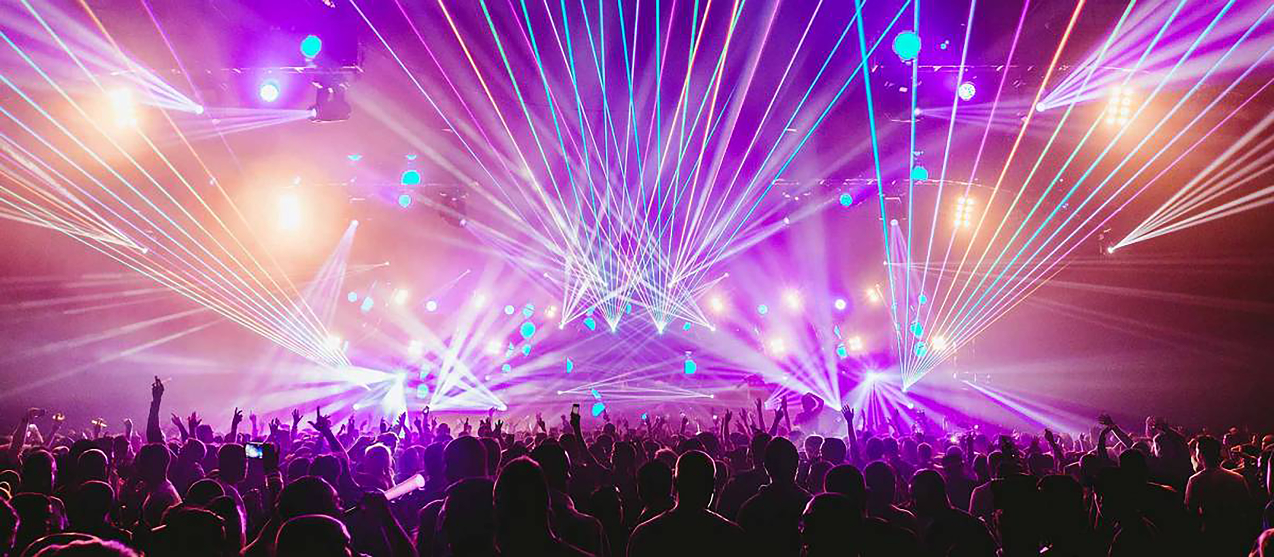 Showering Pavilion at Bath & West Showground with vibrant laser displays for events.