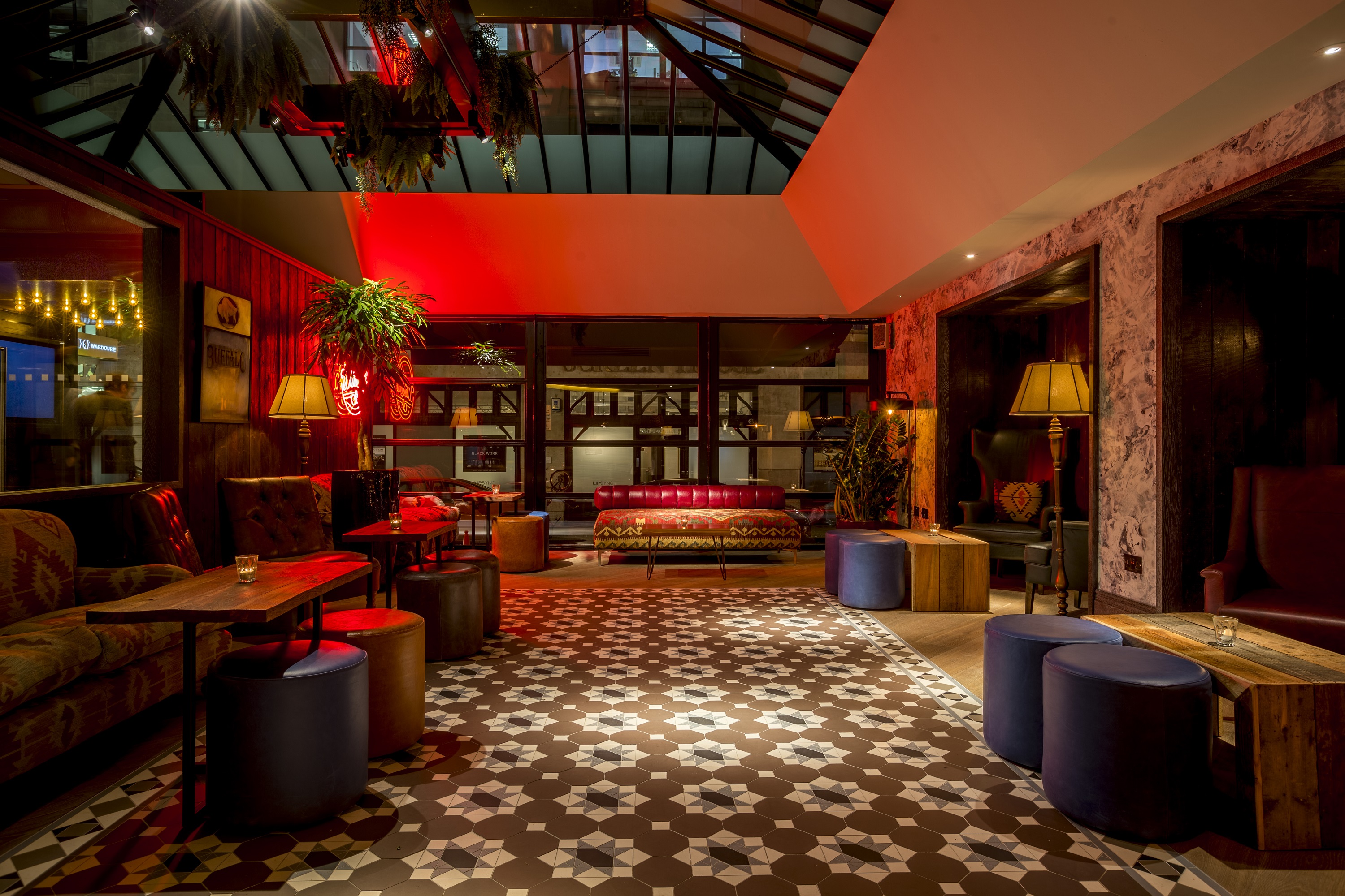 Atrium Room at 100 Wardour Street, stylish lounge for networking events and meetings.