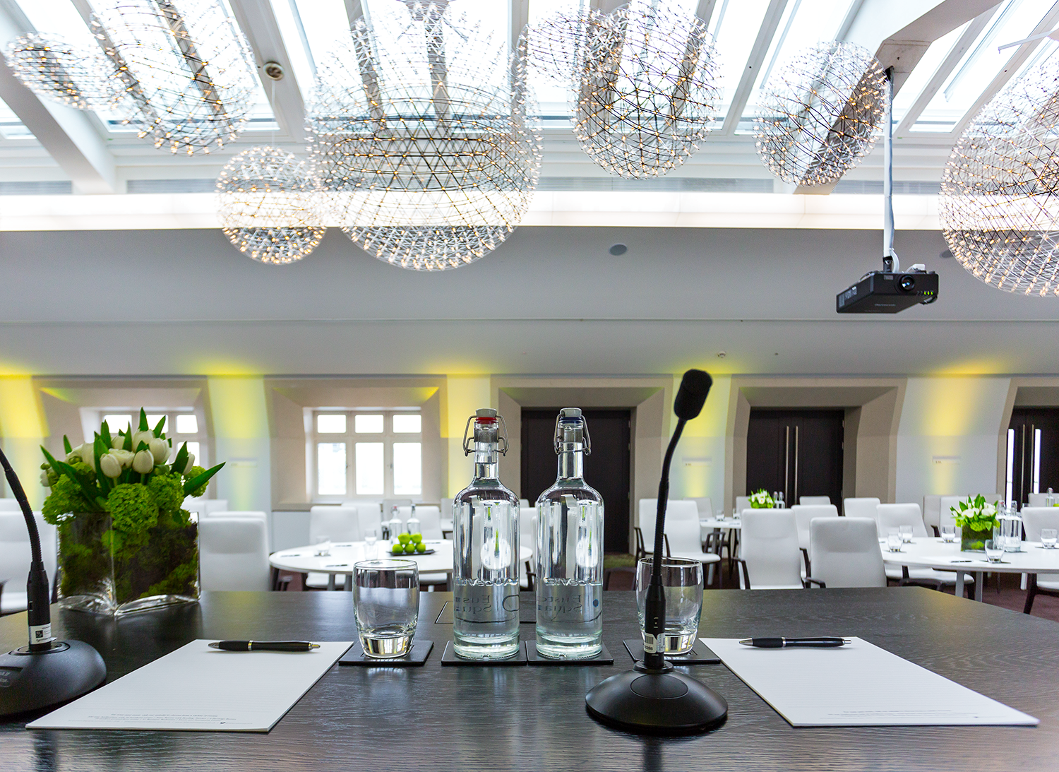 State Rooms meeting room with sleek table, ideal for corporate events and presentations.