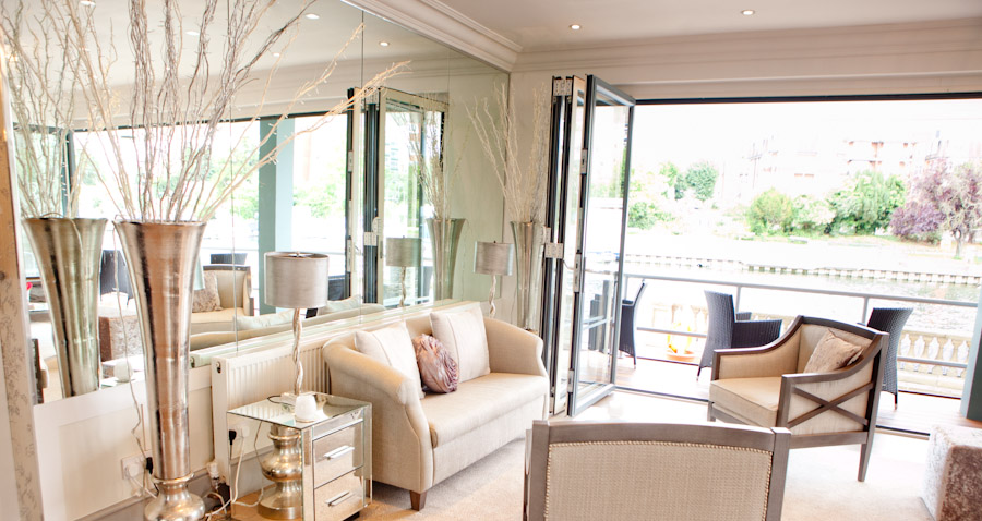 Stylish meeting space with large windows for intimate gatherings on Ravens Ait Island.