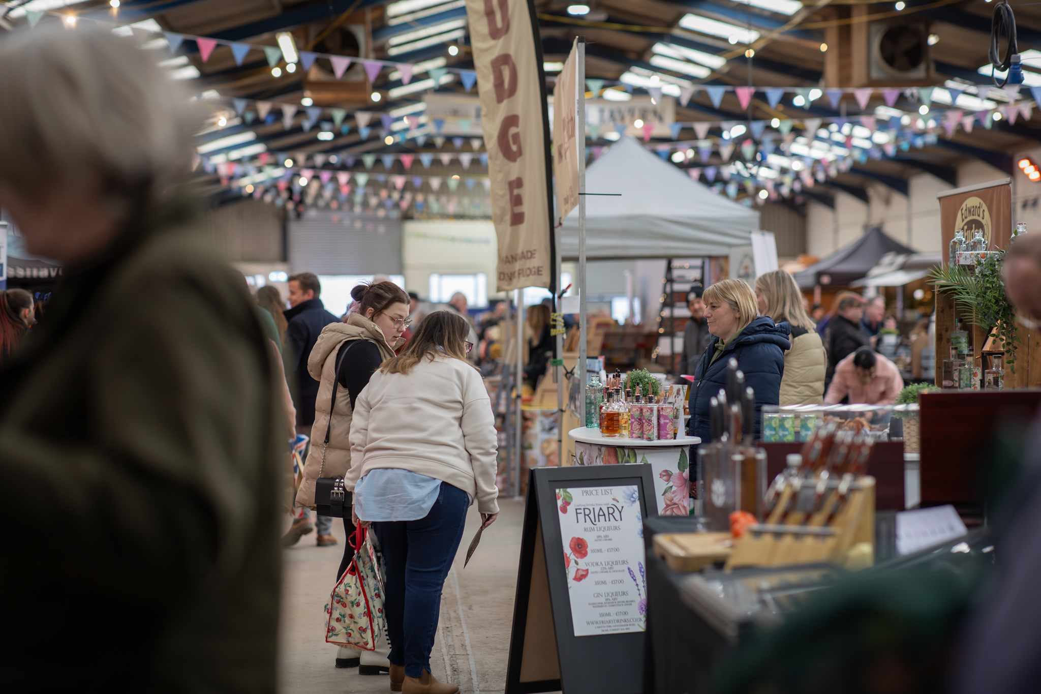 Mendip & Sedgemoor market event at Bath & West Showground with vibrant bunting.