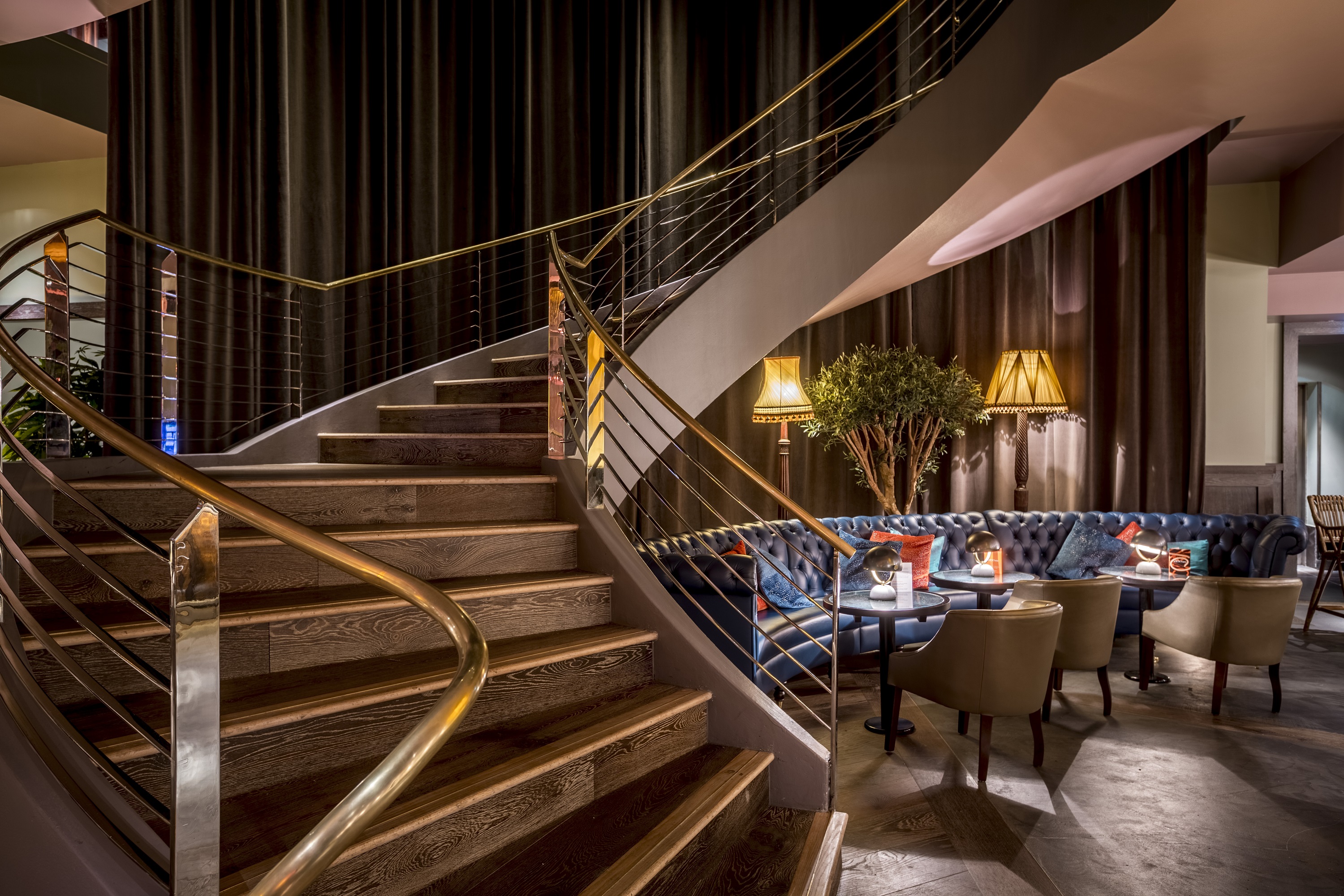 Elegant staircase at The Club, 100 Wardour Street, ideal for networking events and gatherings.