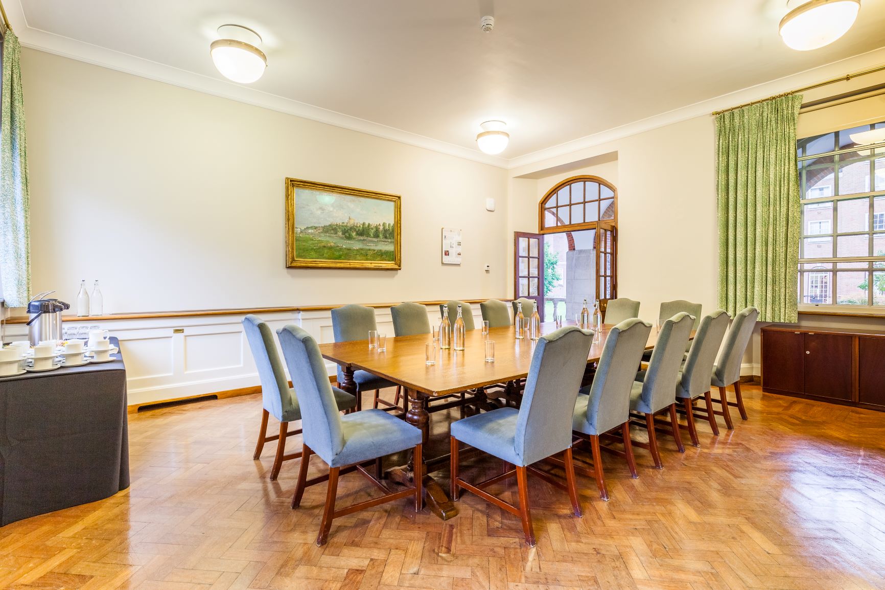 London House Small Common Room: elegant meeting space with wooden table for corporate events.