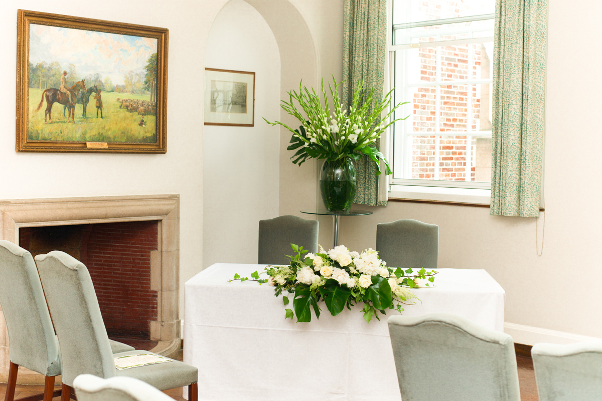 London House Small Common Room with floral centerpiece, ideal for intimate events and gatherings.