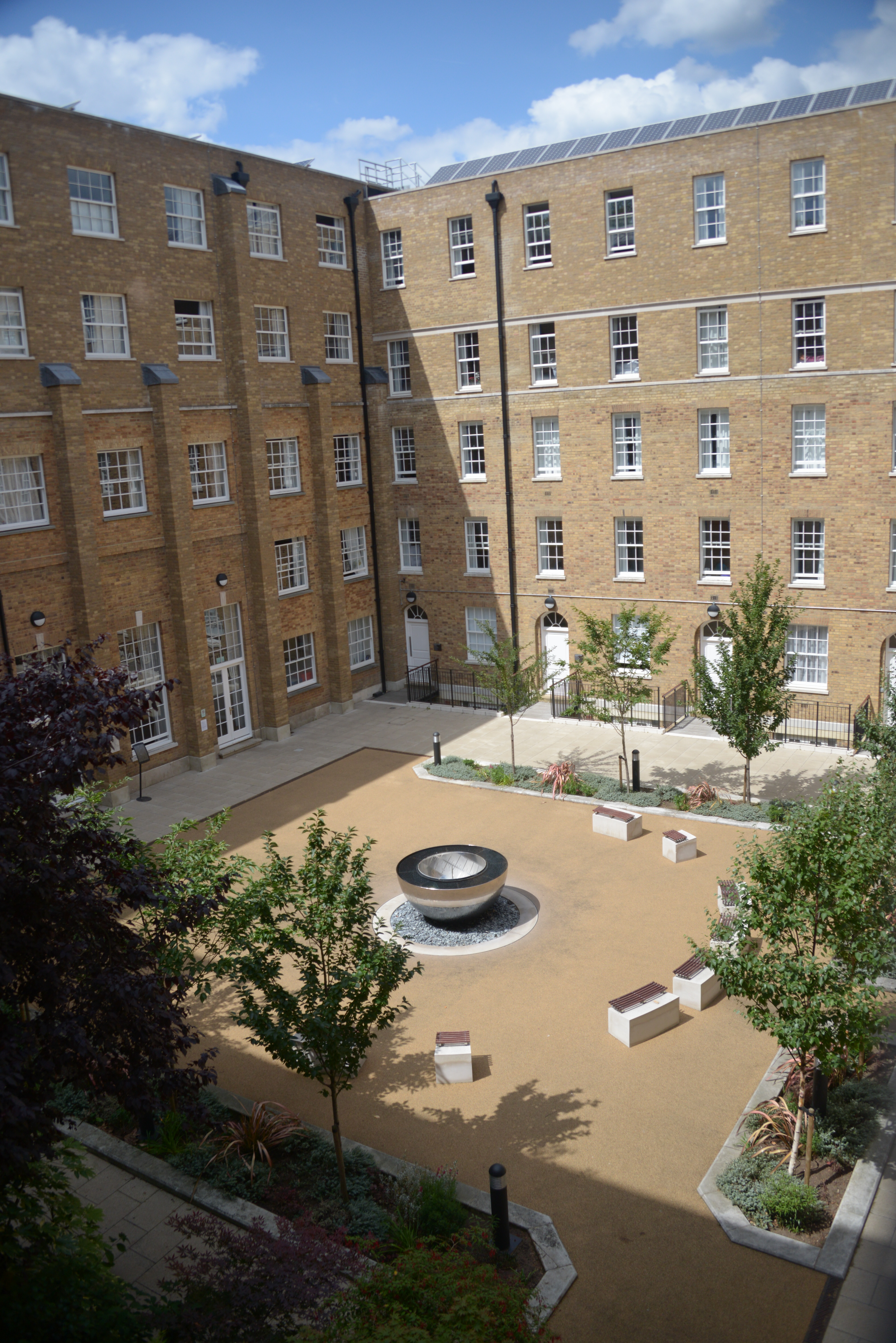 William Goodenough Large Common Room courtyard with fire pit for networking events.
