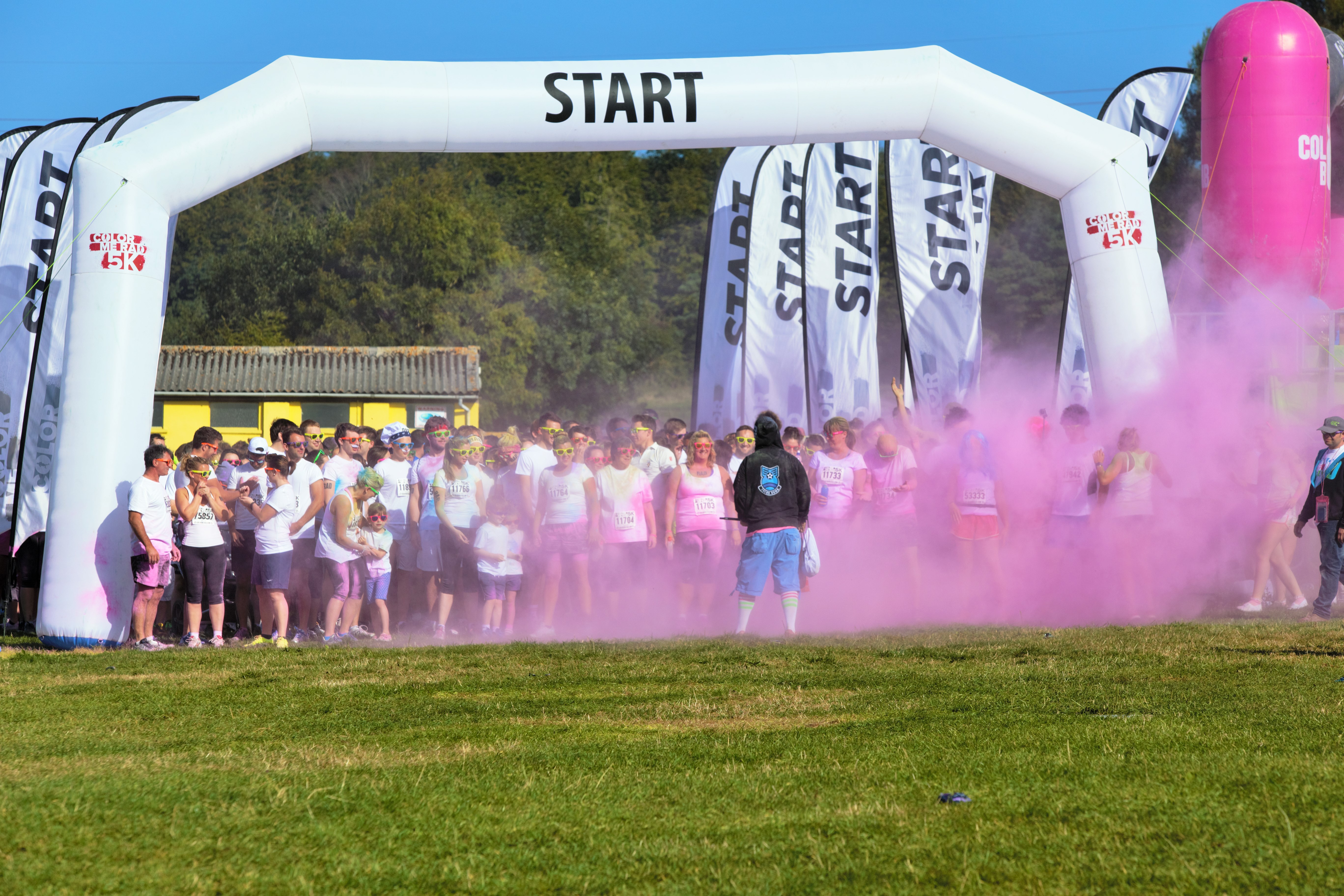 Outdoor event kickoff at Bath & West Showground with colorful start line and inflatable arch.