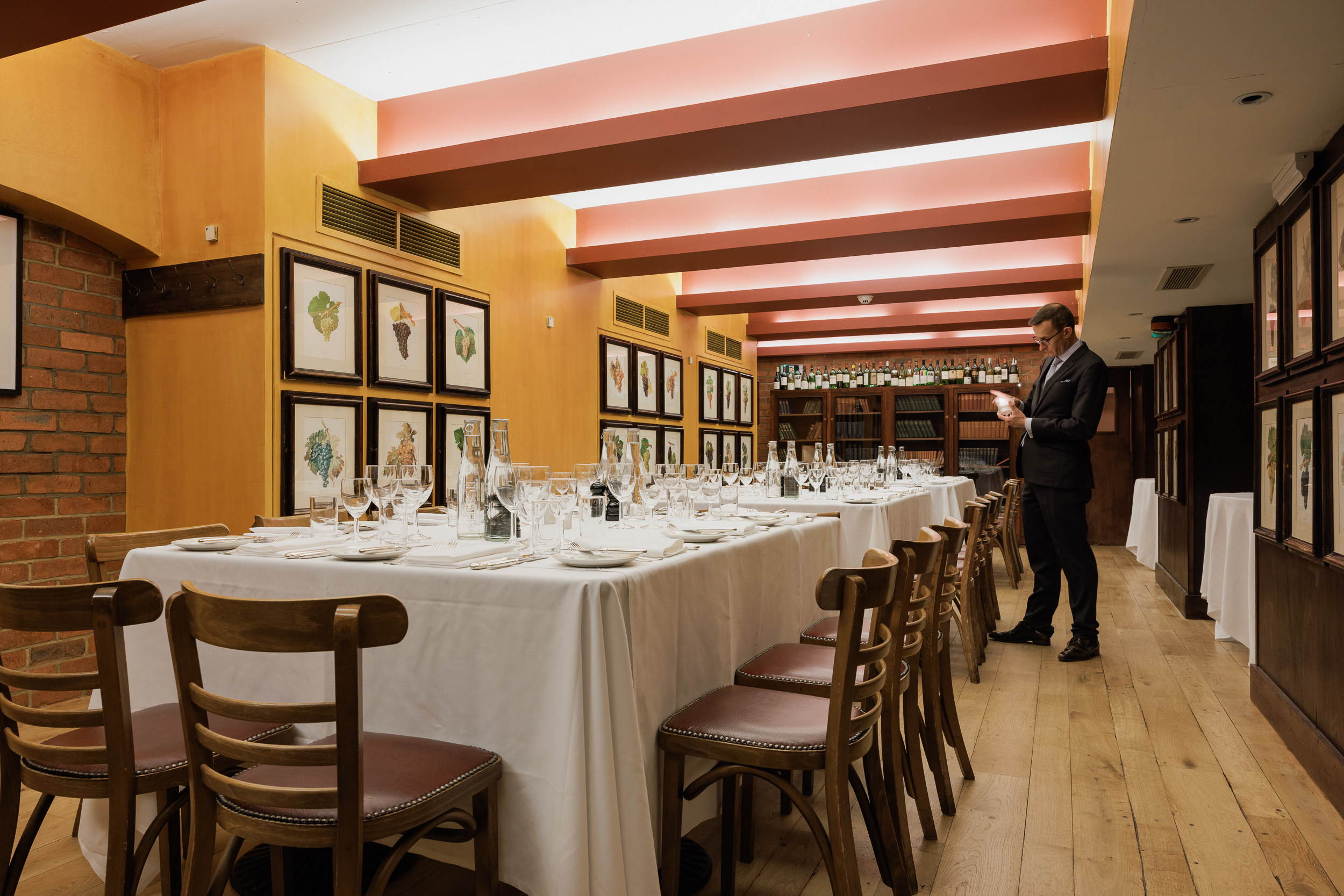 Elegant dining room setup for intimate corporate dinner or networking event.