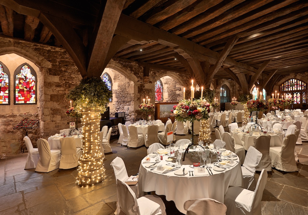 Elegant banquet hall in The Crypt with stained glass, perfect for weddings and corporate events.