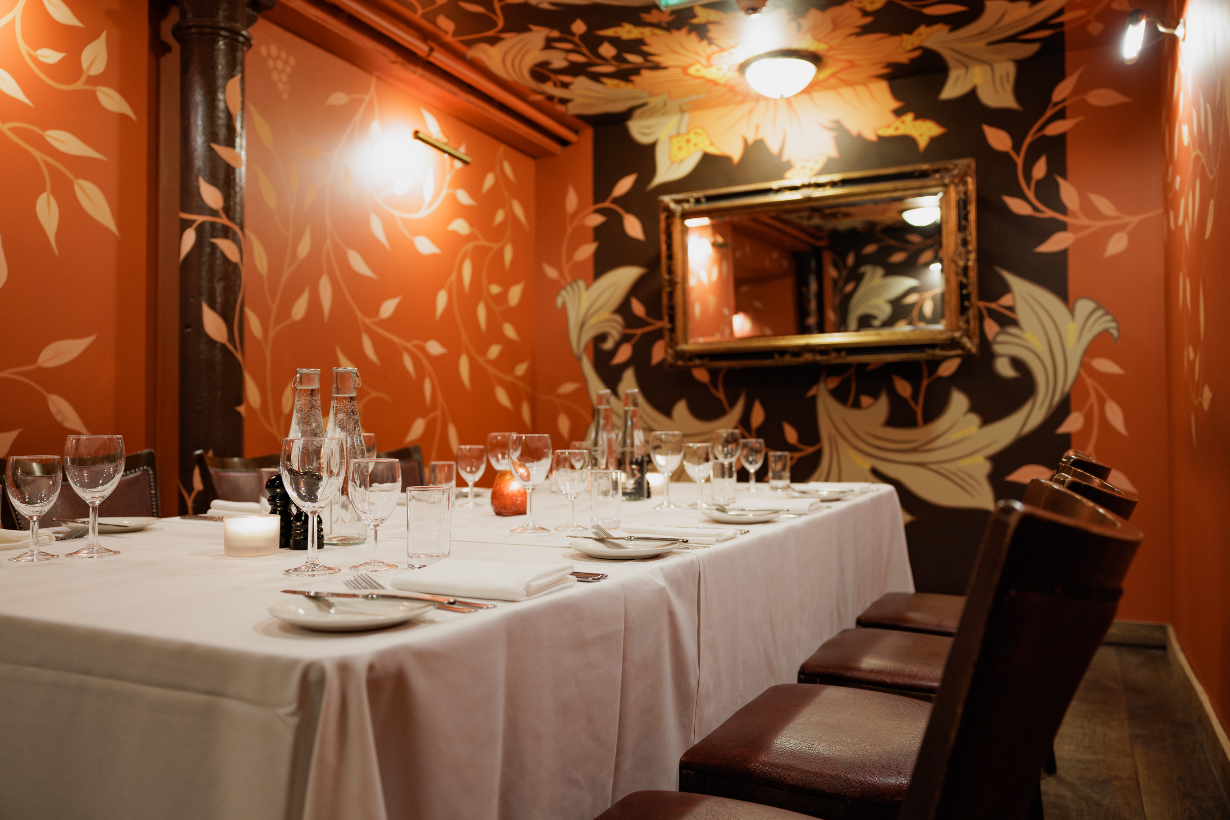 Elegant dining table in cozy private room for intimate events at Bleeding Heart.