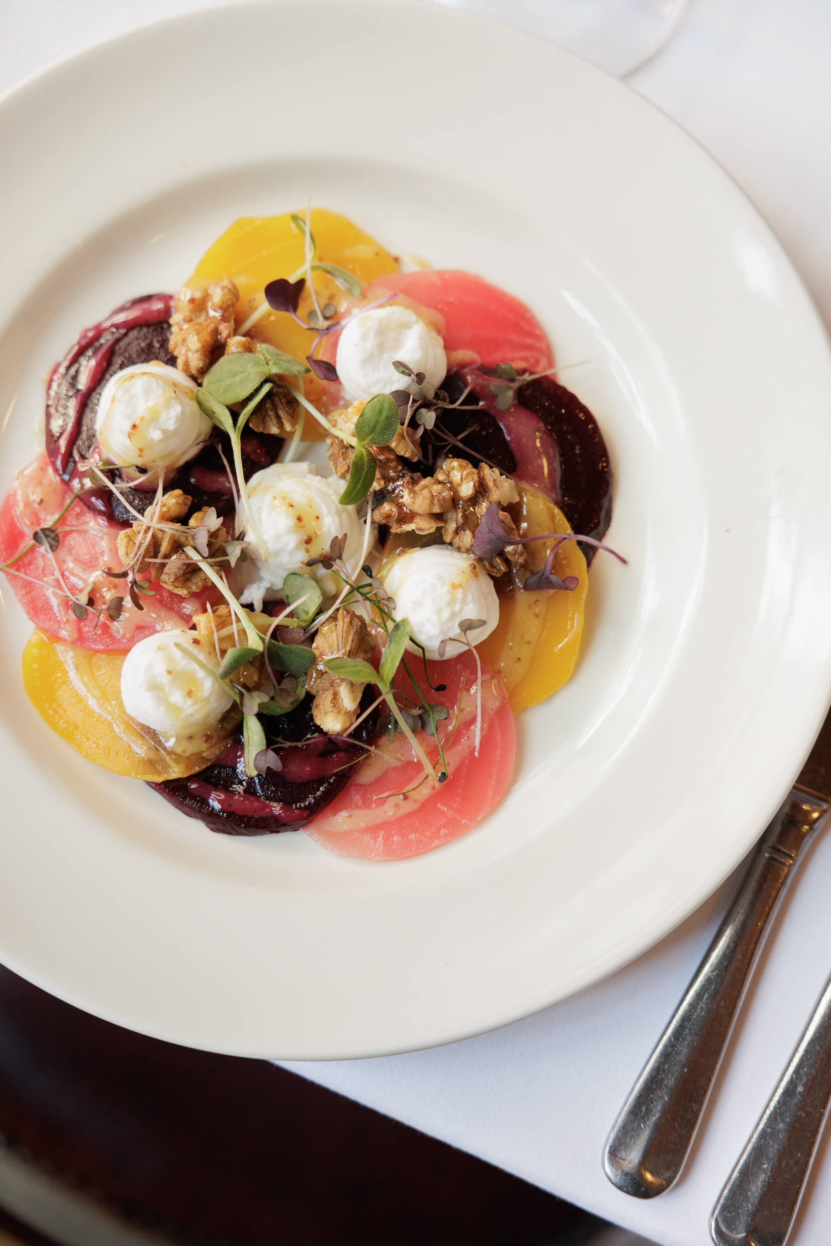 Vibrant vegetable dish with cheese in Bleeding Heart wine cellar for events and catering.