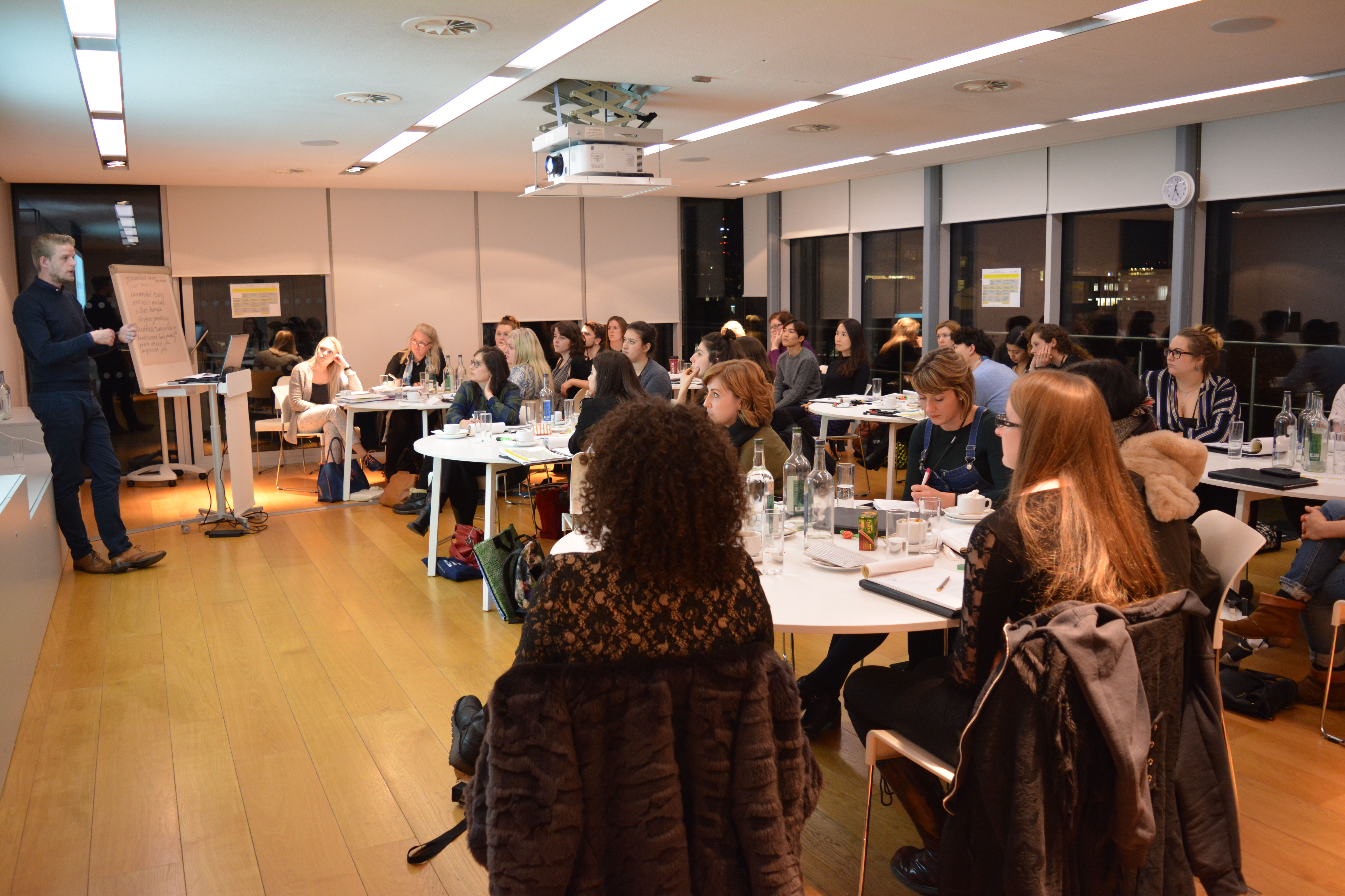 Agas Harding Conference Room with round tables for engaging presentations and networking.