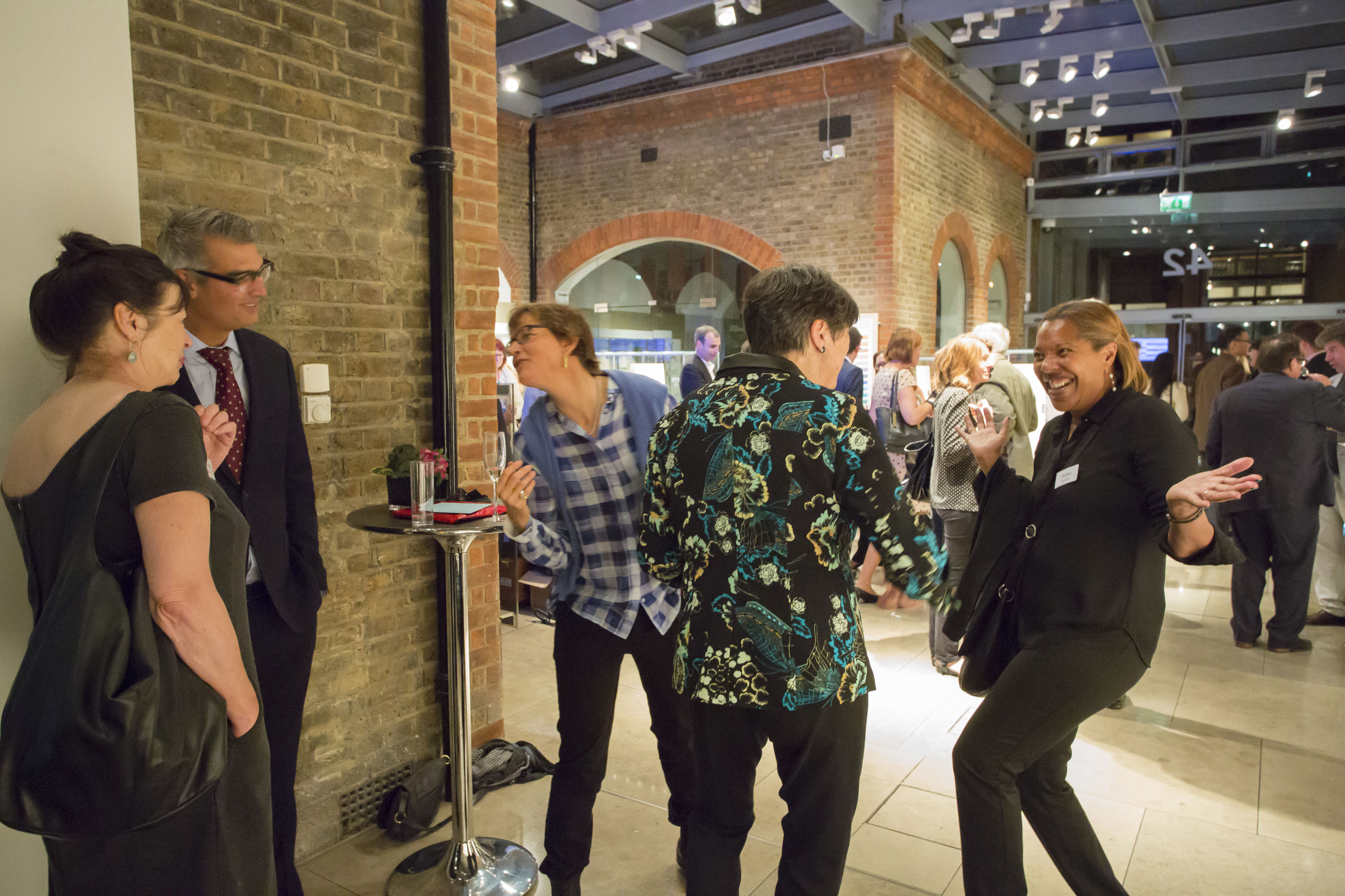 Lively networking event in The Goldsmiths' Centre Atrium, showcasing modern design and engagement.