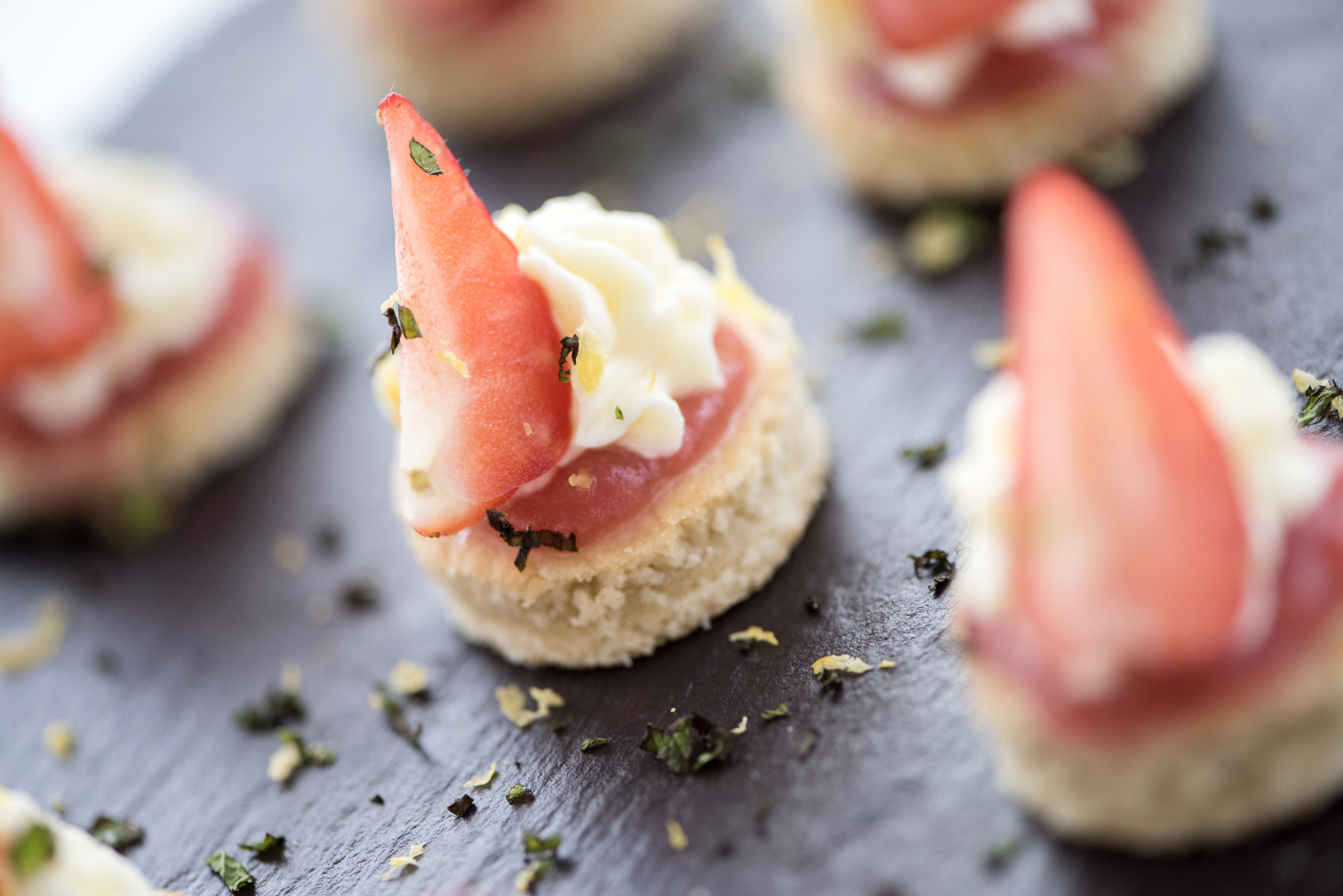 Elegant gourmet canapés with fruit and cream for upscale events at The Goldsmiths' Centre.